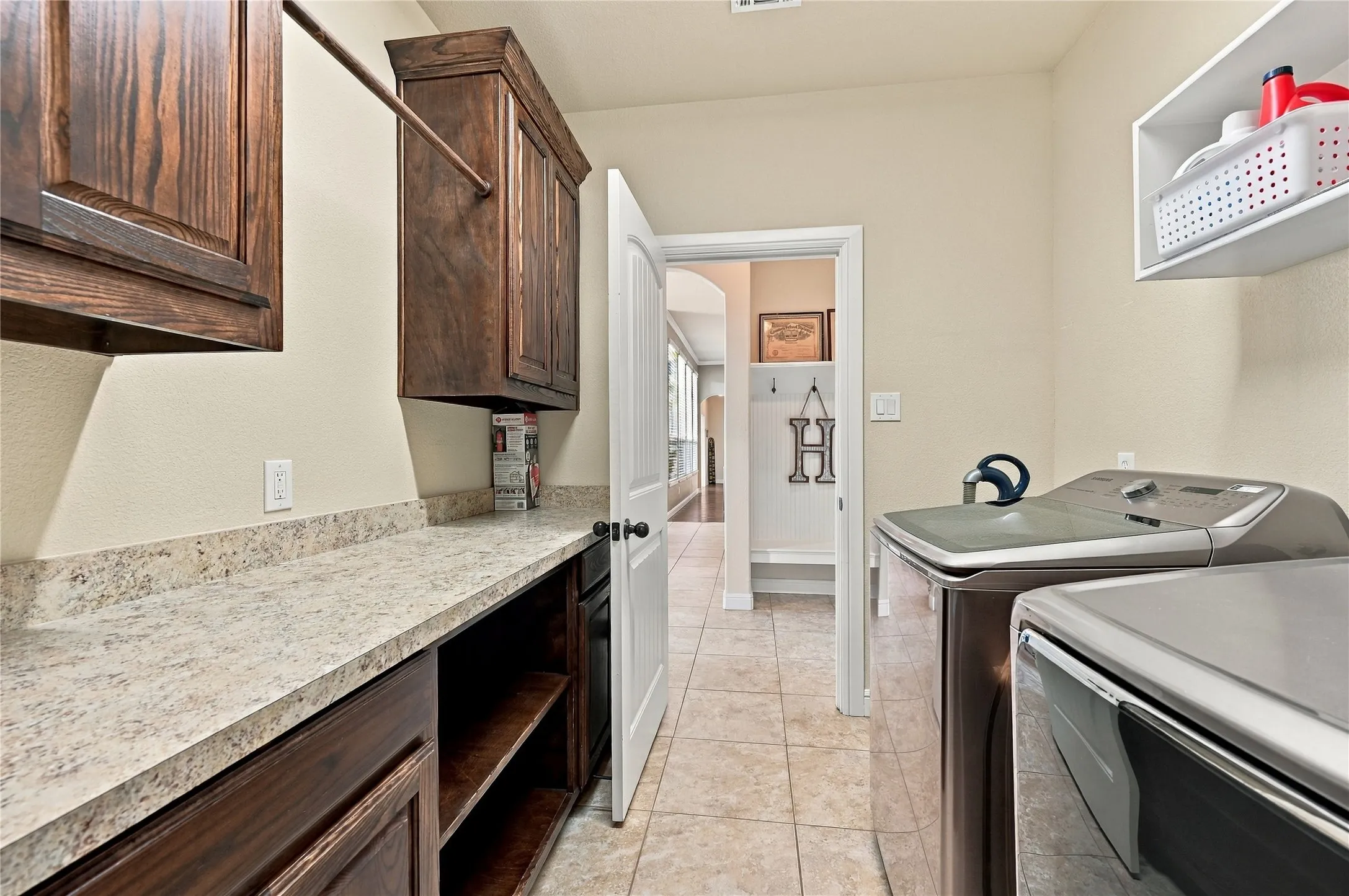 Laundry room with storage