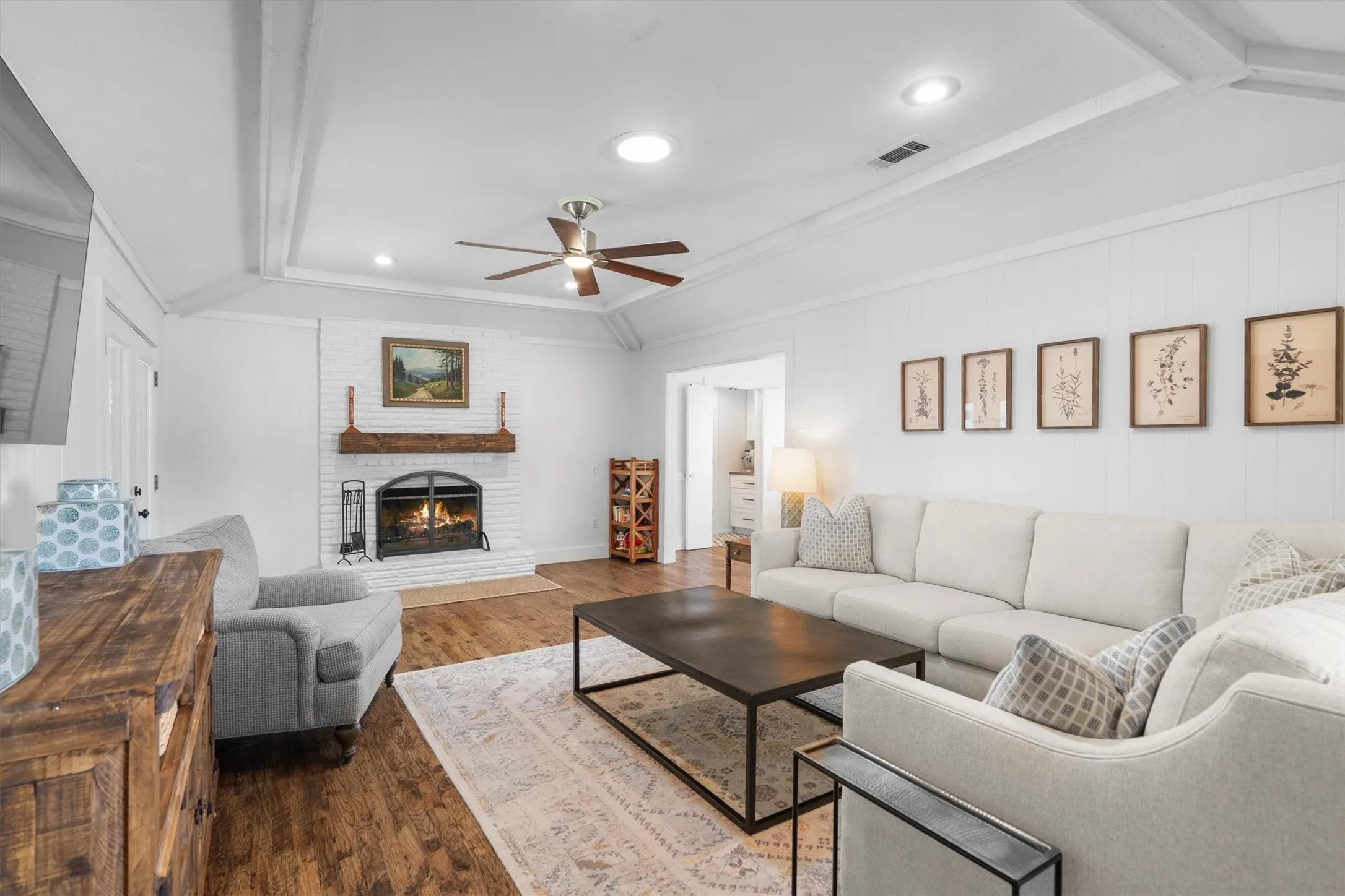 Beautiful fireplace and vaulted ceilings.