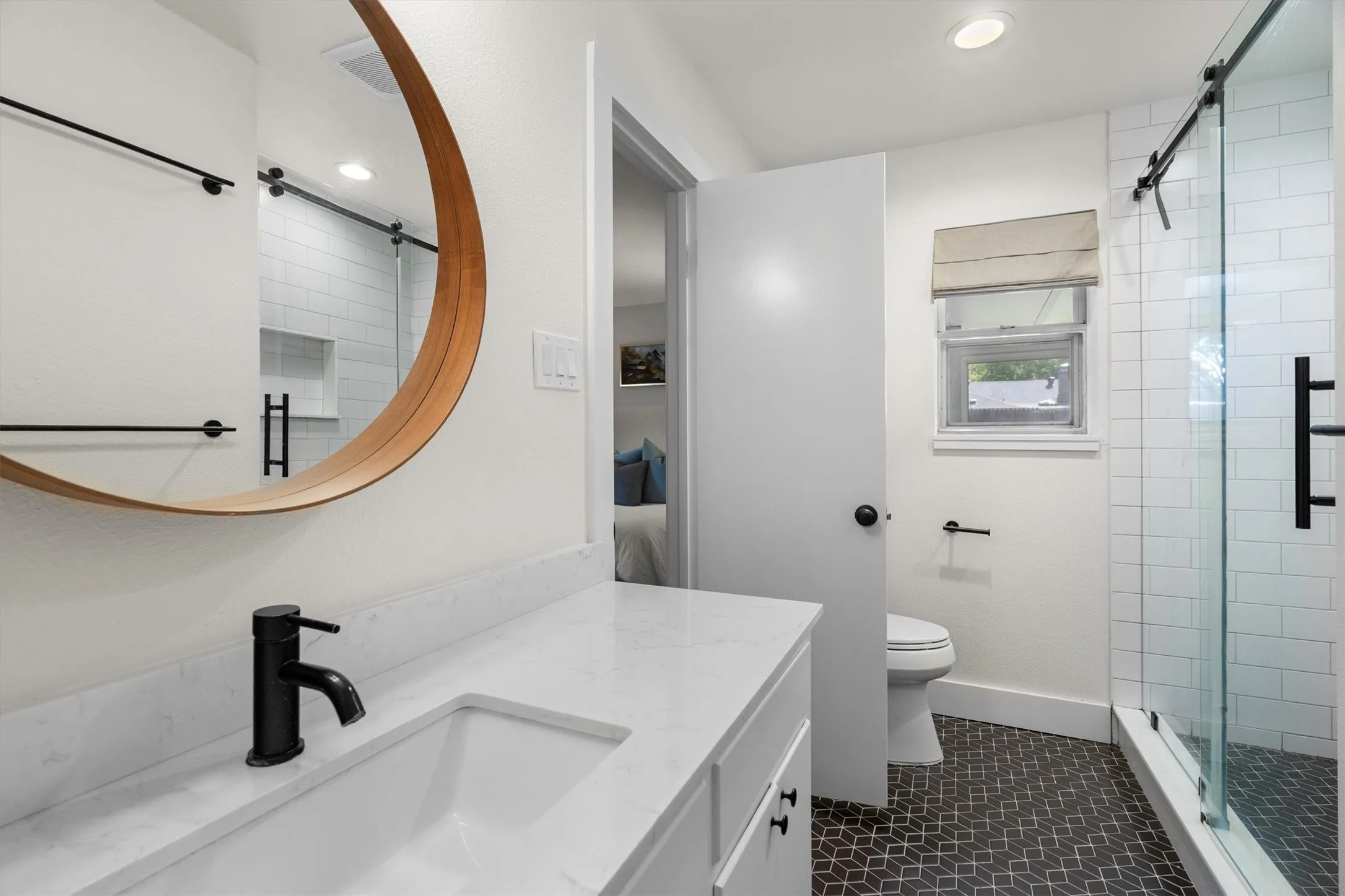 Beautiful primary bath with extra large vanity and stunning walk-in shower.
