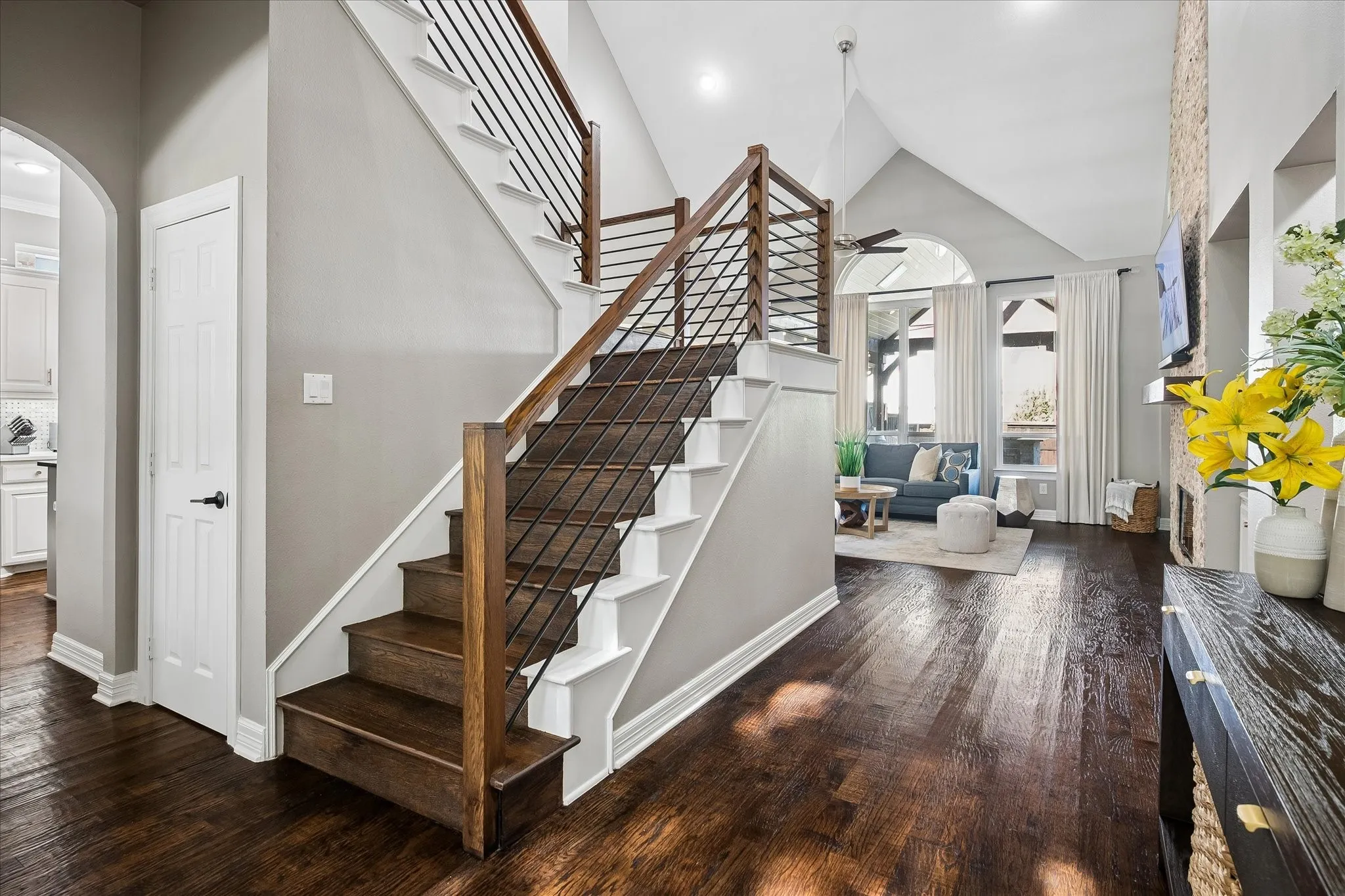 Dark wood-finish flooring throughout