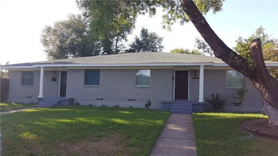 0.28-acre lot beneath mature shade trees