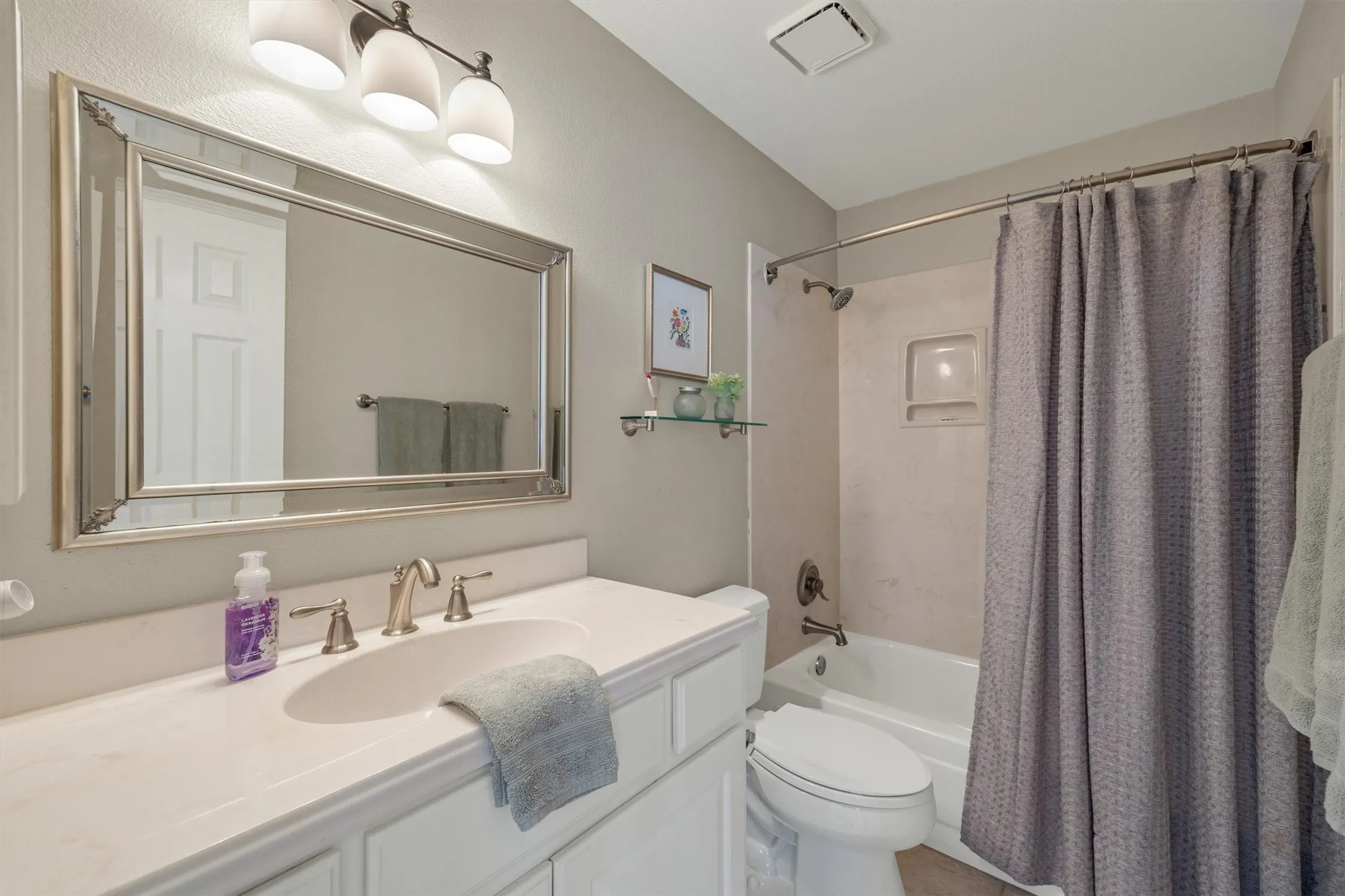 This is the second full bath with a tub-shower.