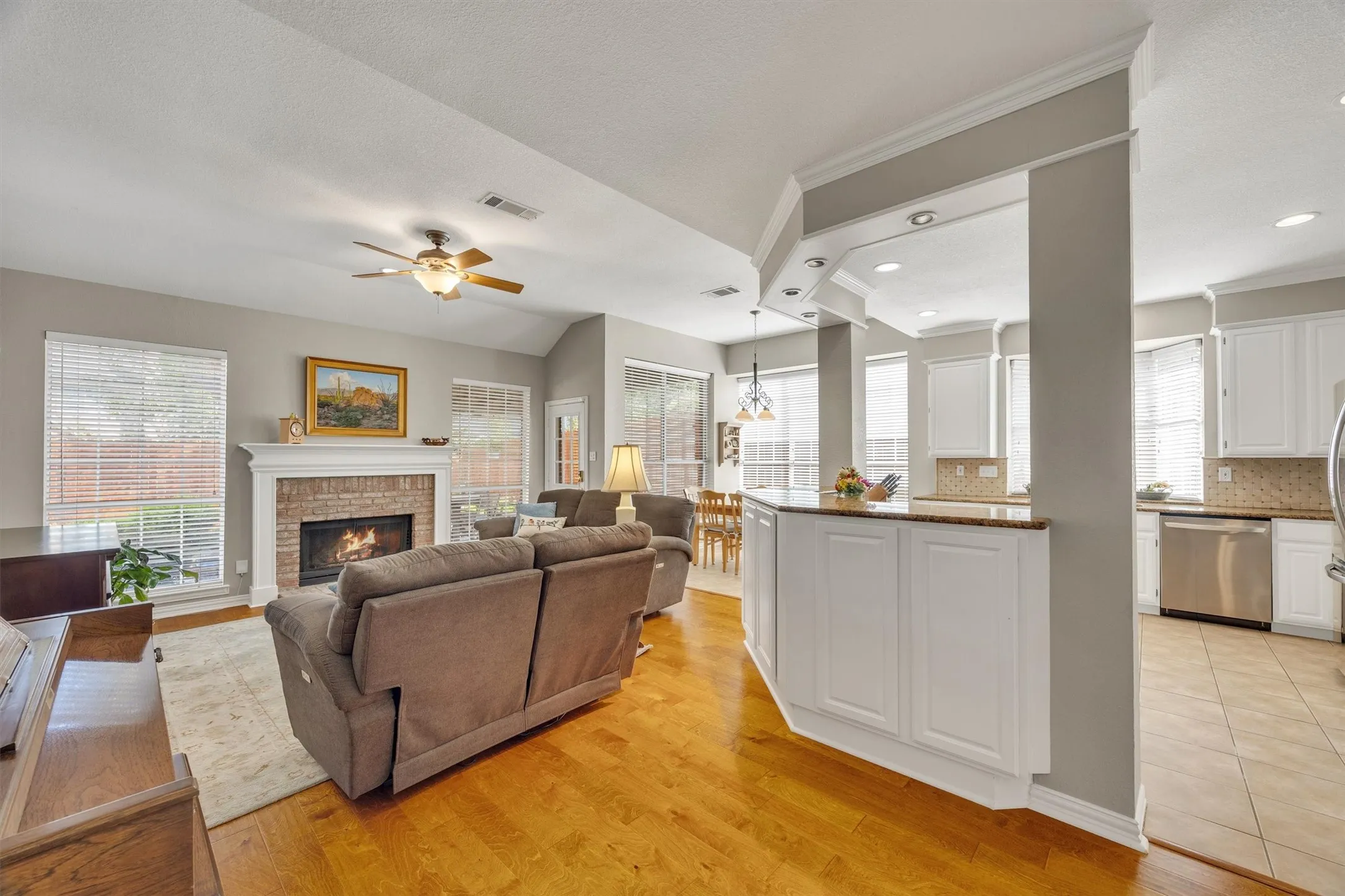 Tall ceilings and lots of windows make the living space bright & airy!