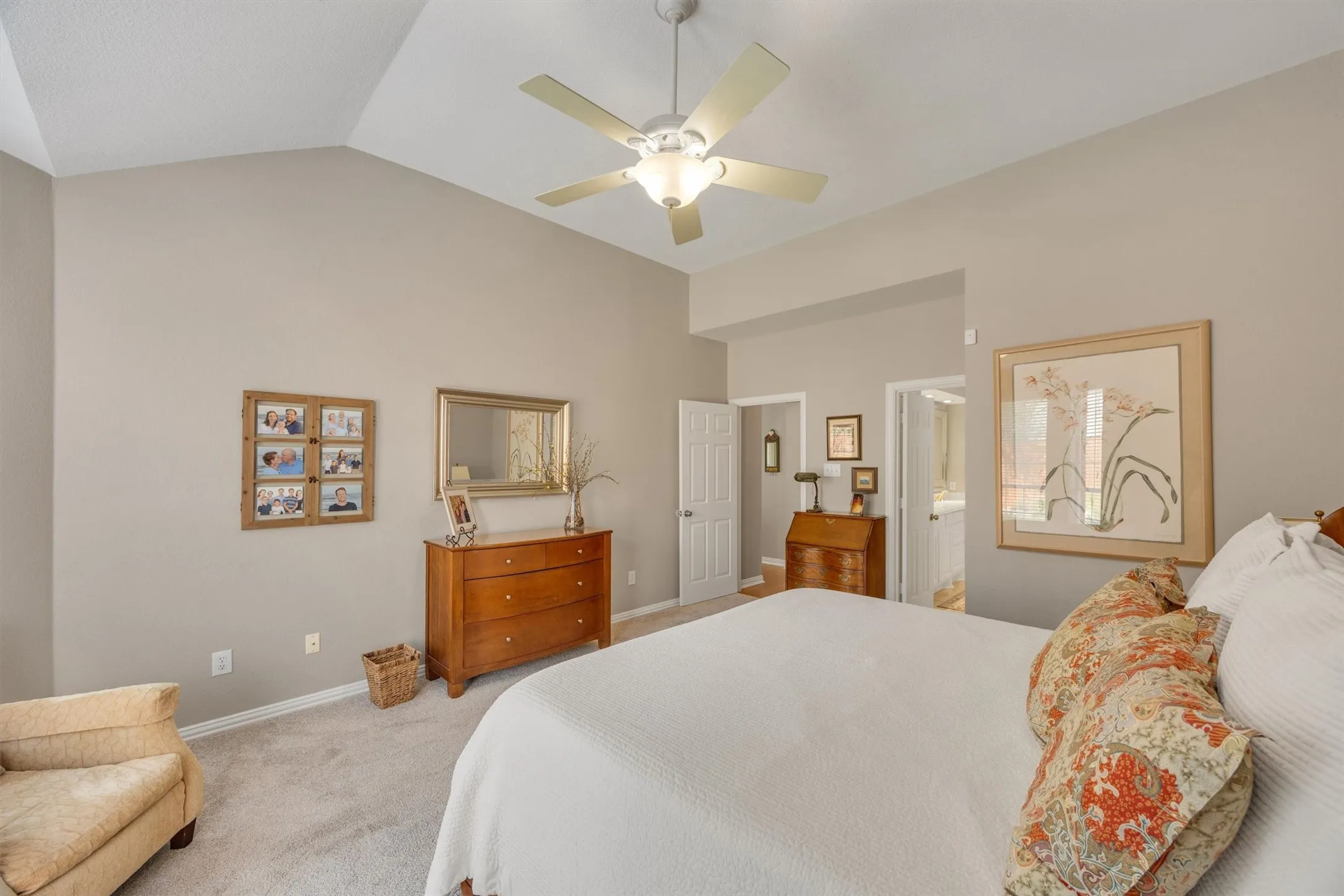Large primary bedroom includes sitting area, ensuite bath and barely lived on carpet!
