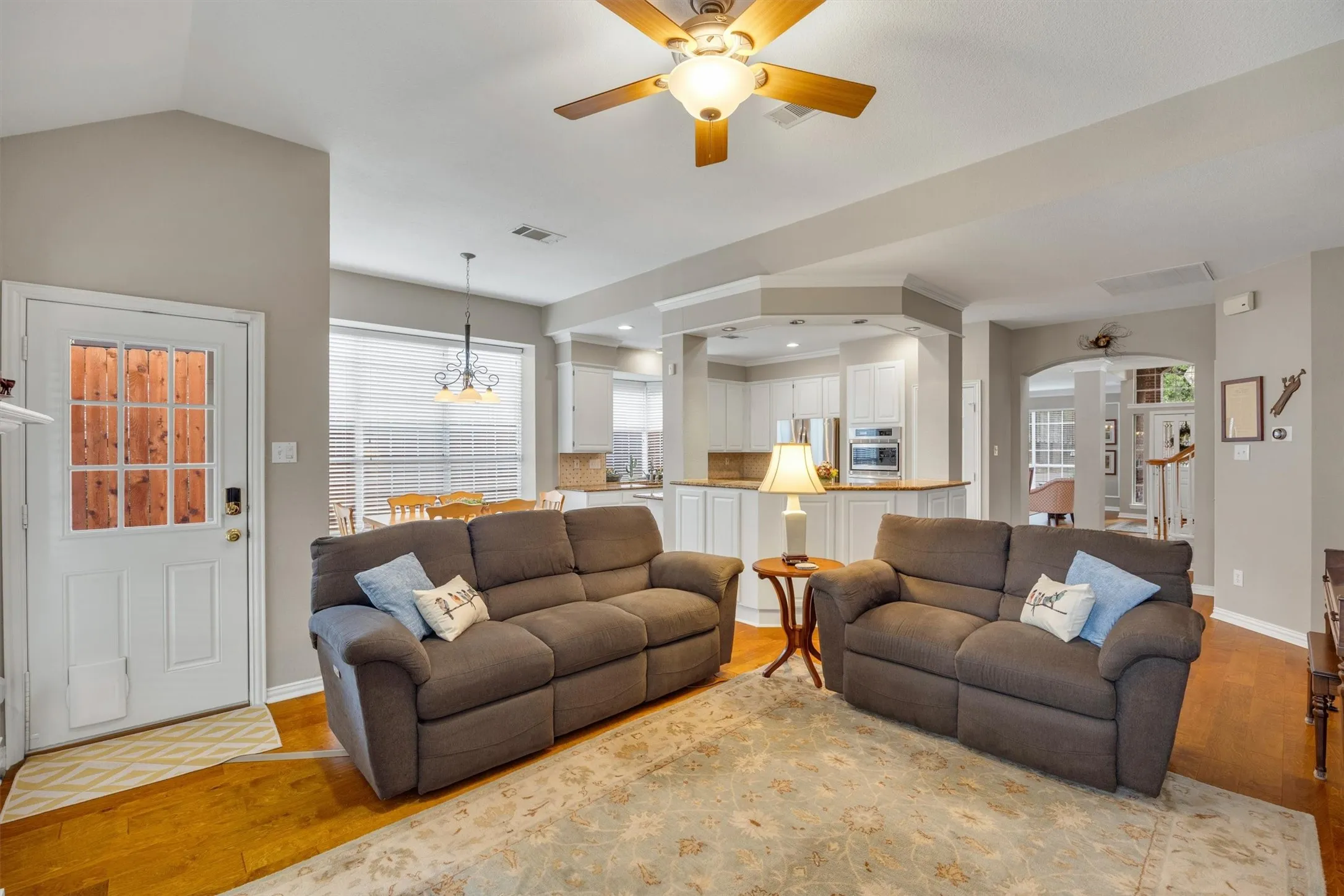 Engineered hardwood floors flow from the front door to the back door!
