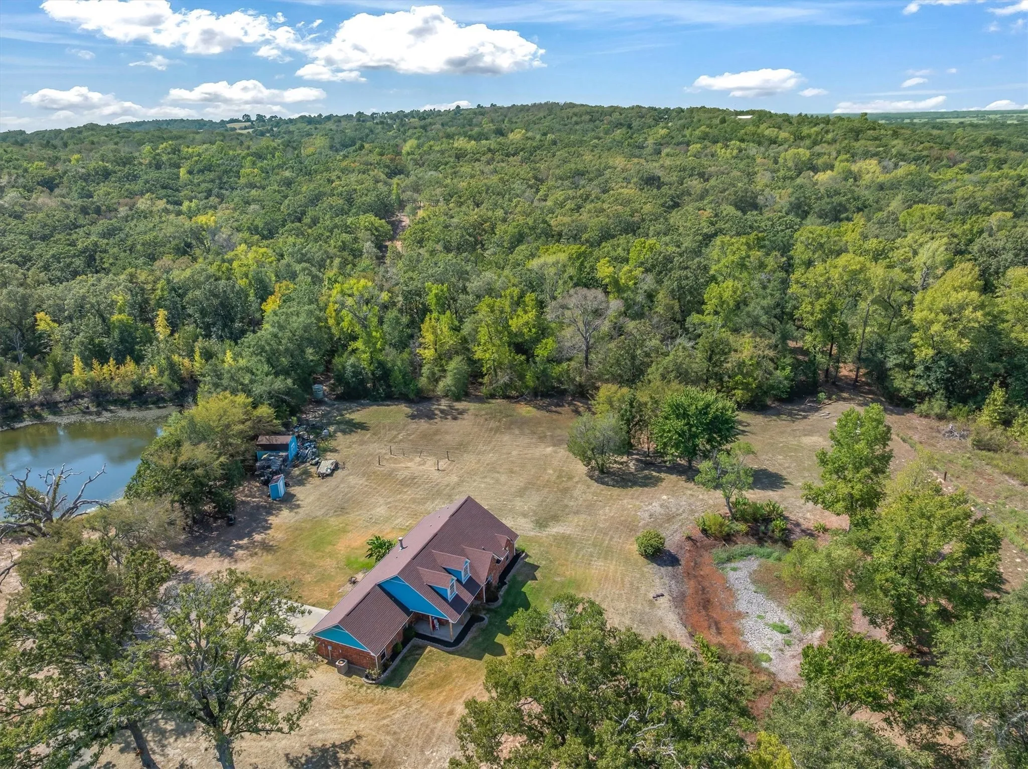 Nestled among woods this private property offers privacy and tranquility