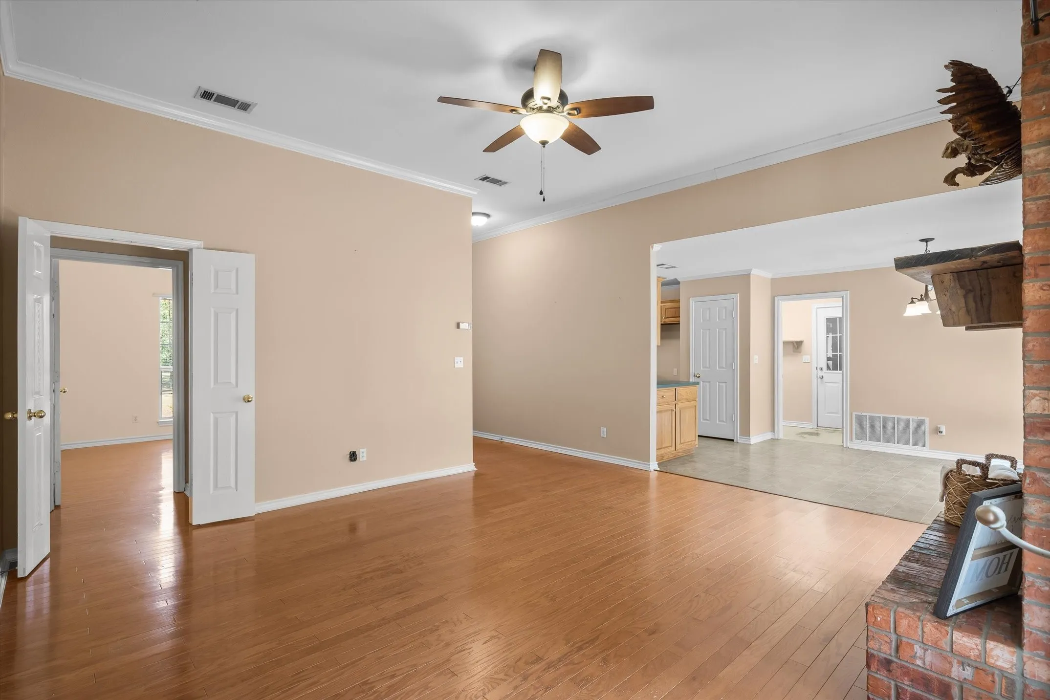 The true wood floors make this living space cozy!
