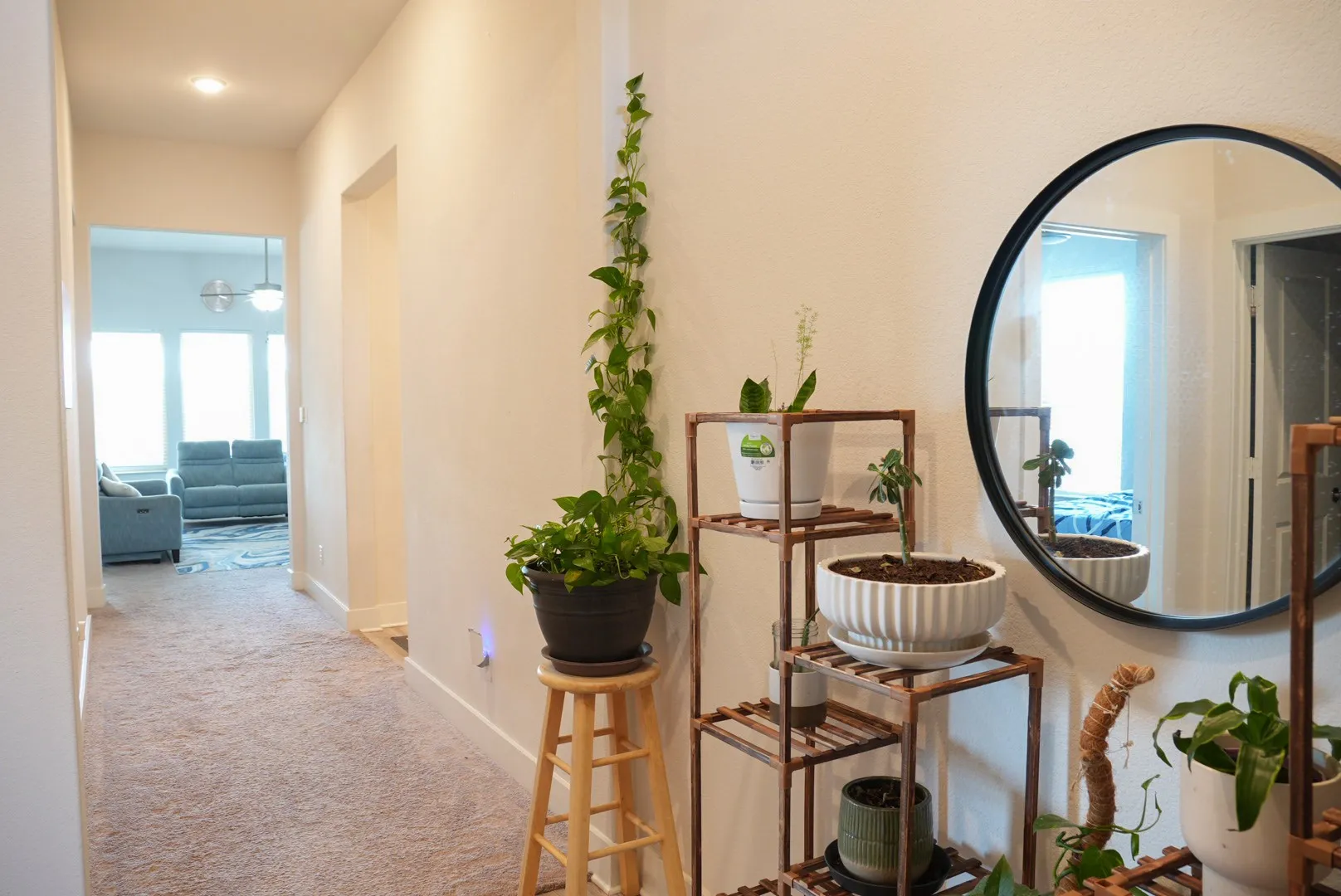 Hallway featuring recessed lighting and carpet flooring