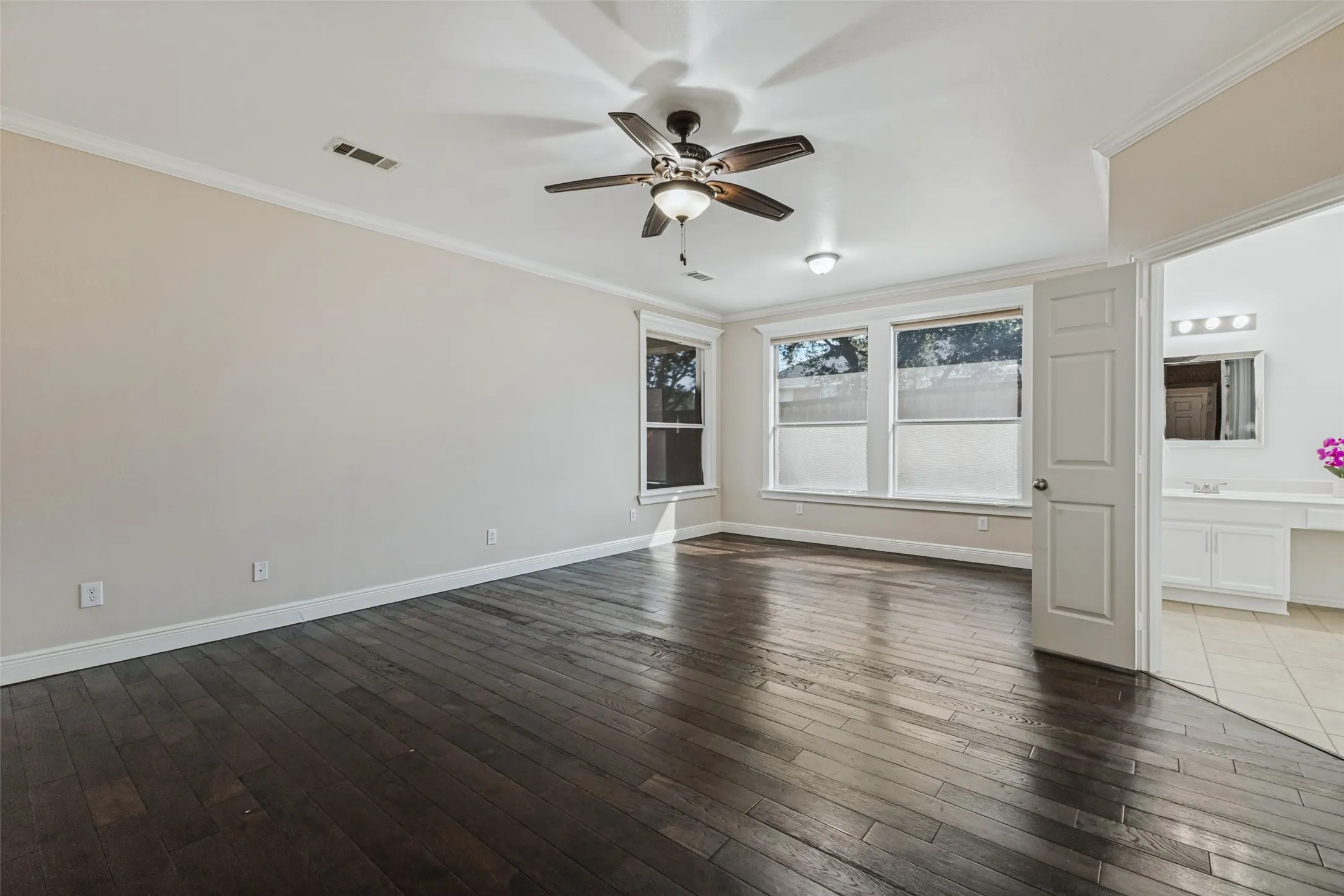 Spacious primary bedroom with sitting area