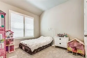 Recessed lighting, light gray wall paint, and gray carpet