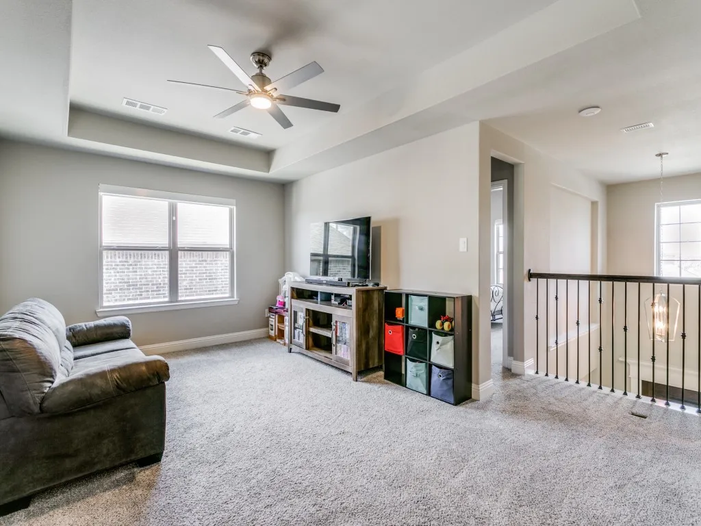 Spacious gameroom upstairs with one of 3 walk-in attic spaces