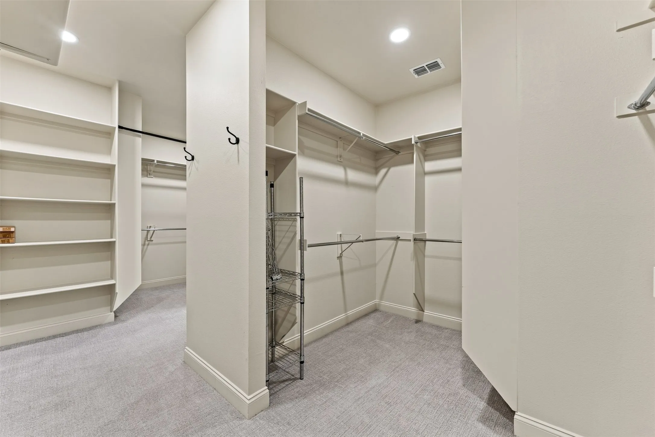 Oversized primary closet with plenty of space