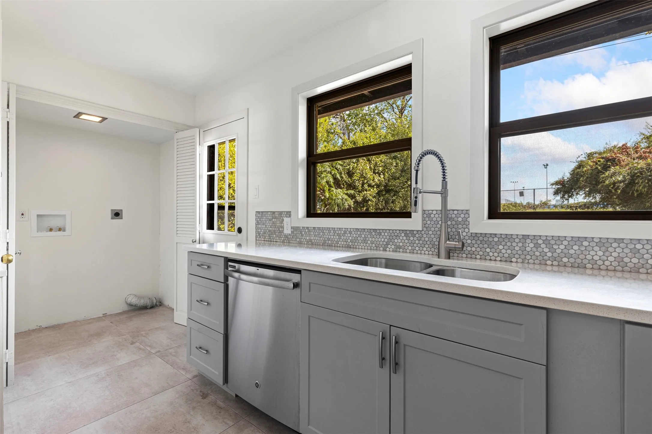 Utility closet is seen in this view.