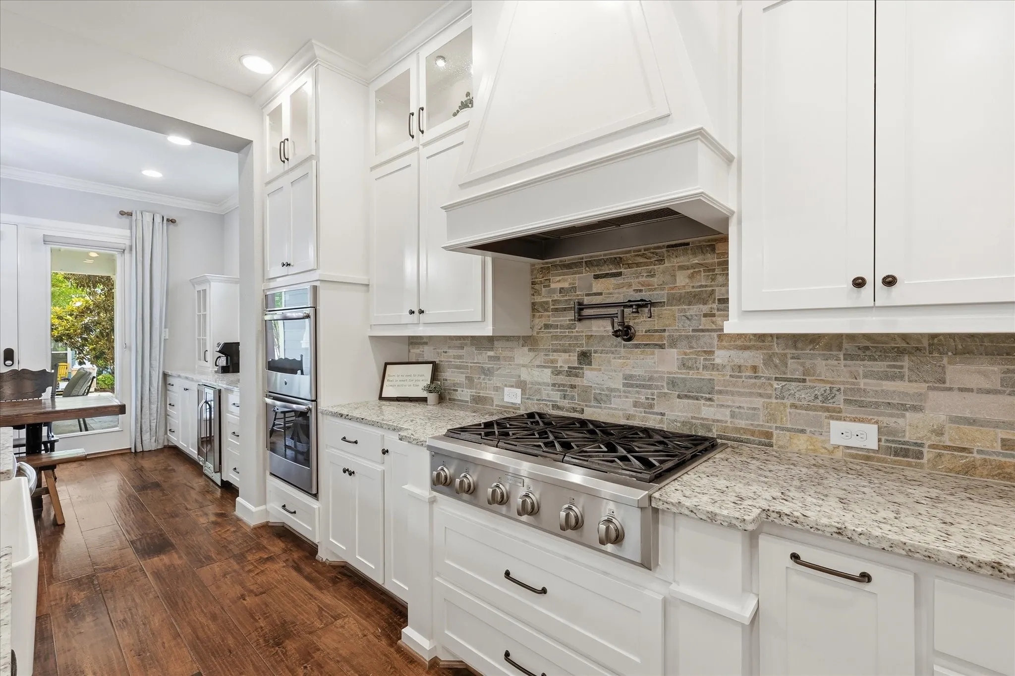 Gas cooktop with a pot filler.
