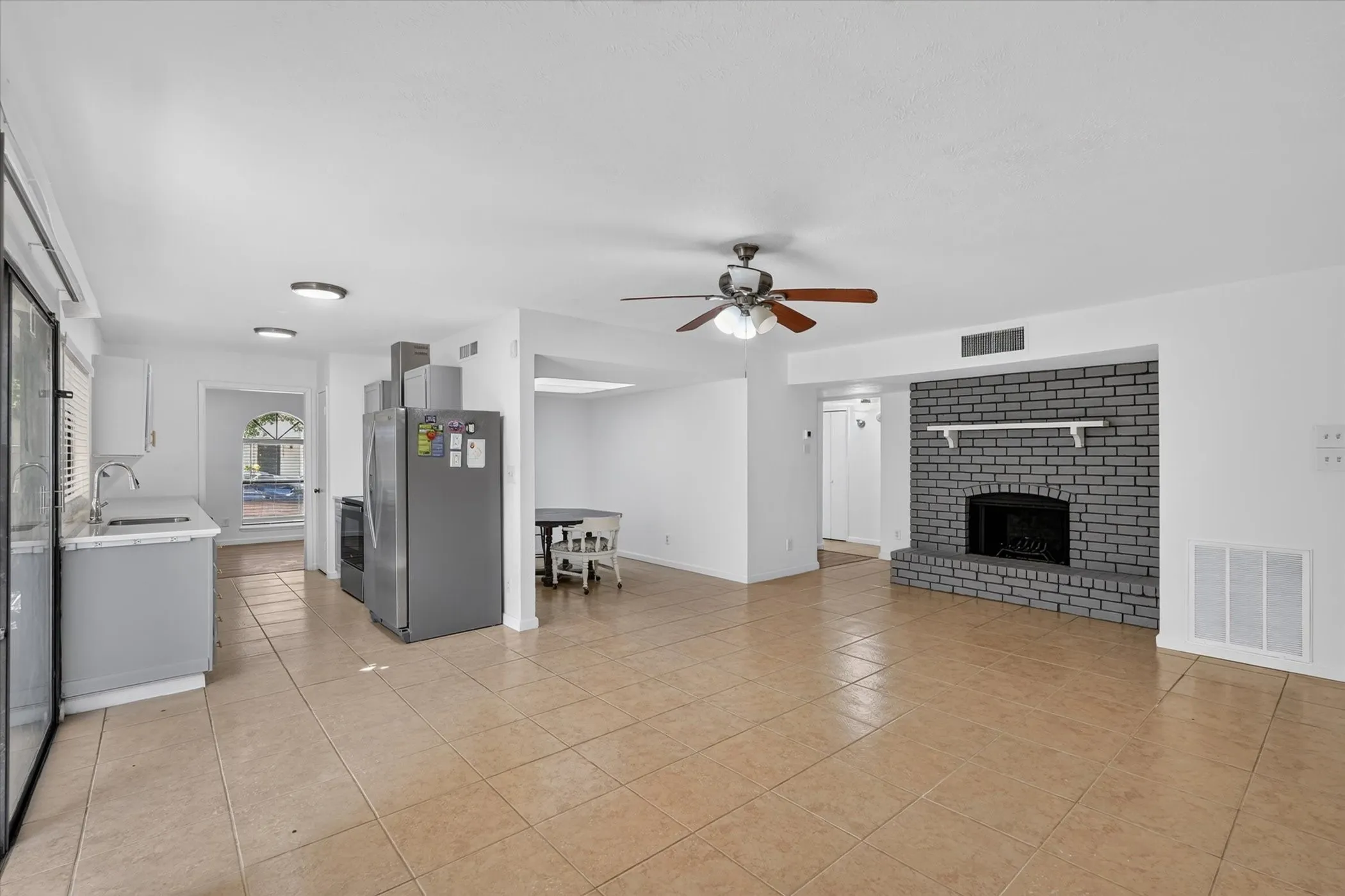 Living room, kitchen, and dining area