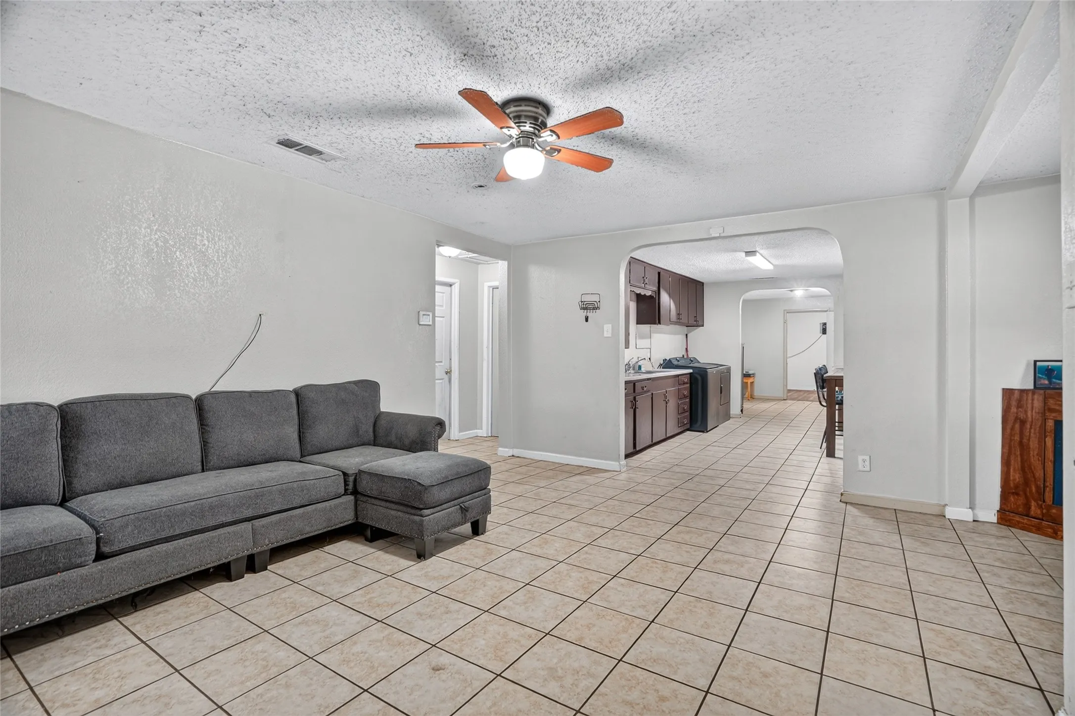 Tile flooring throughout the main living areas