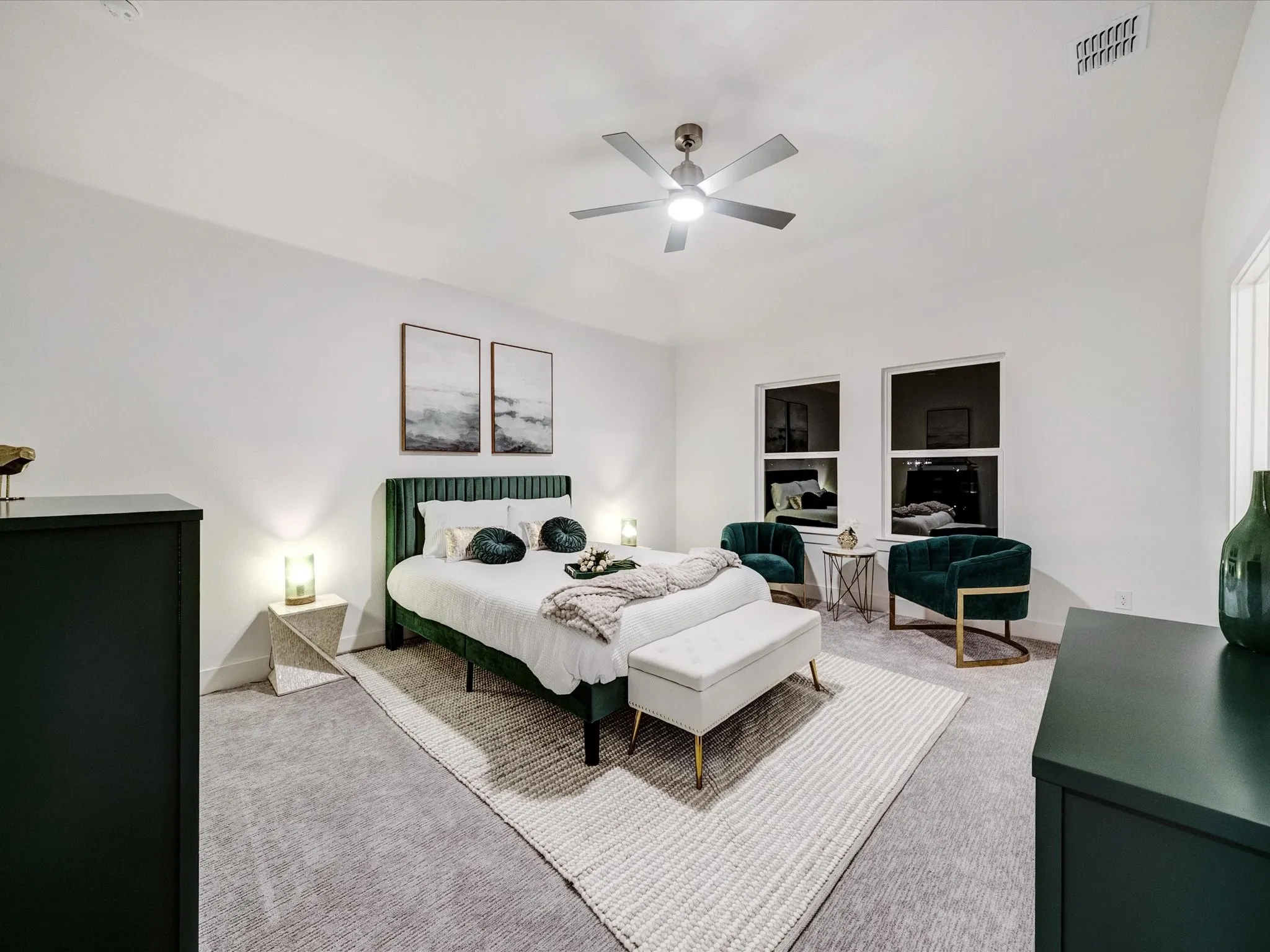 Bedroom featuring carpet and a ceiling fan