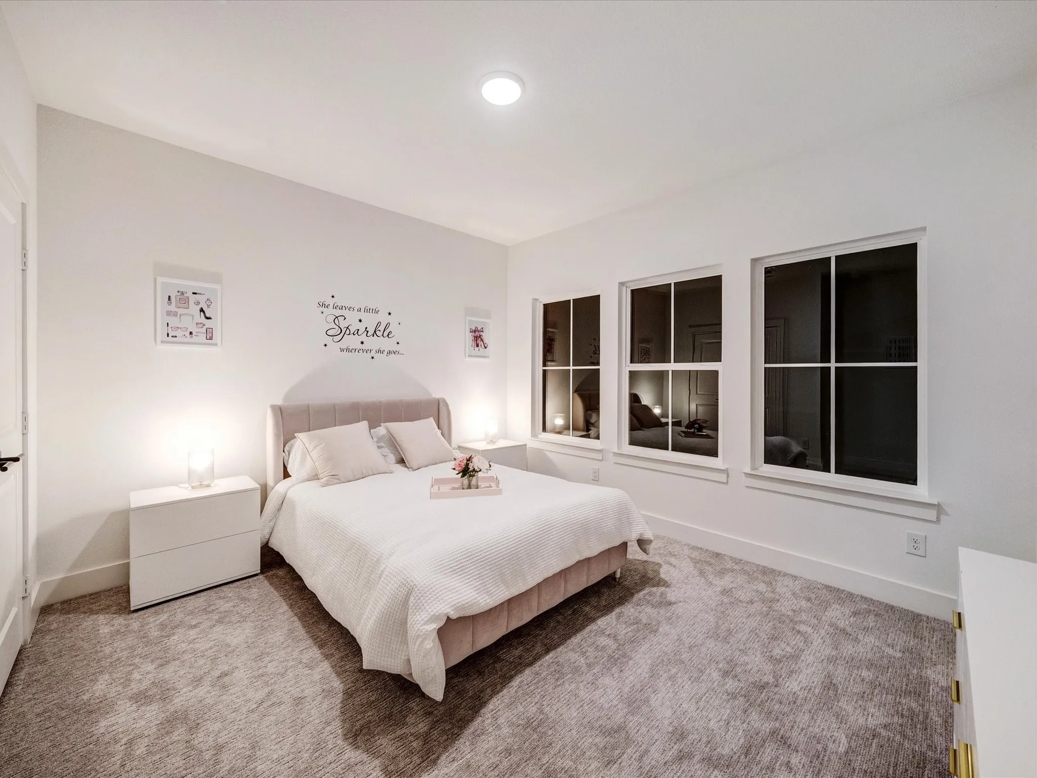 Carpeted bedroom with baseboards