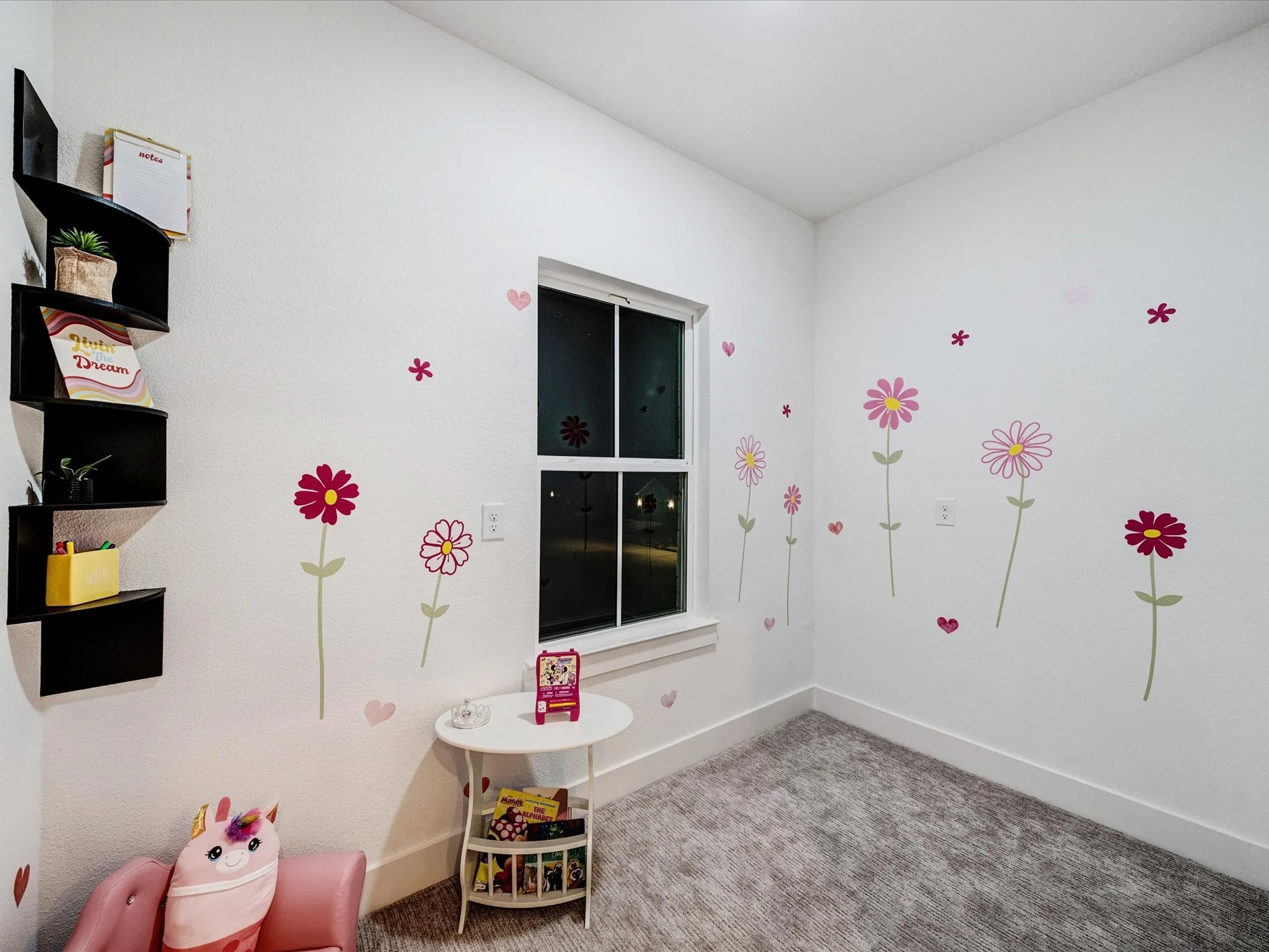 Rec room with carpet floors and baseboards