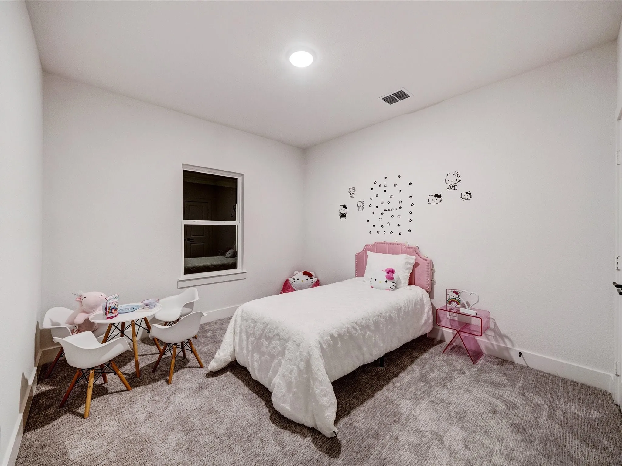 Carpeted bedroom featuring baseboards