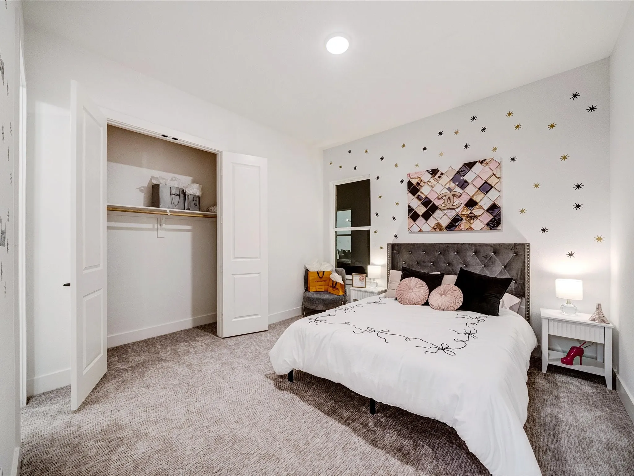 Bedroom featuring carpet floors and a closet