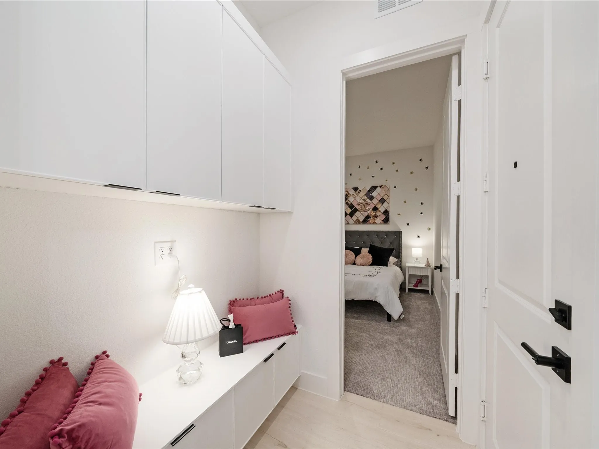 Mudroom featuring light wood-type flooring