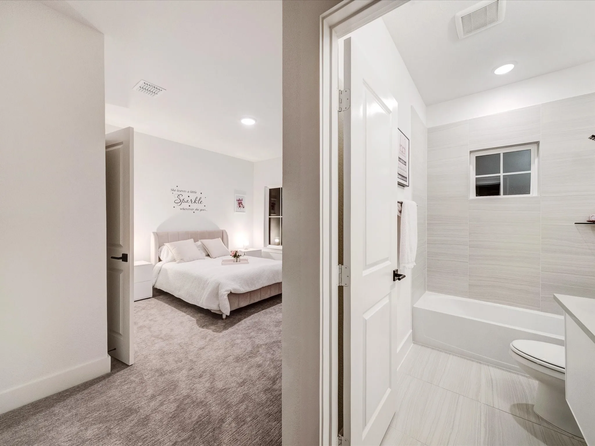 Full bathroom with ensuite bathroom, light colored carpet, recessed lighting, shower / washtub combination, and vanity