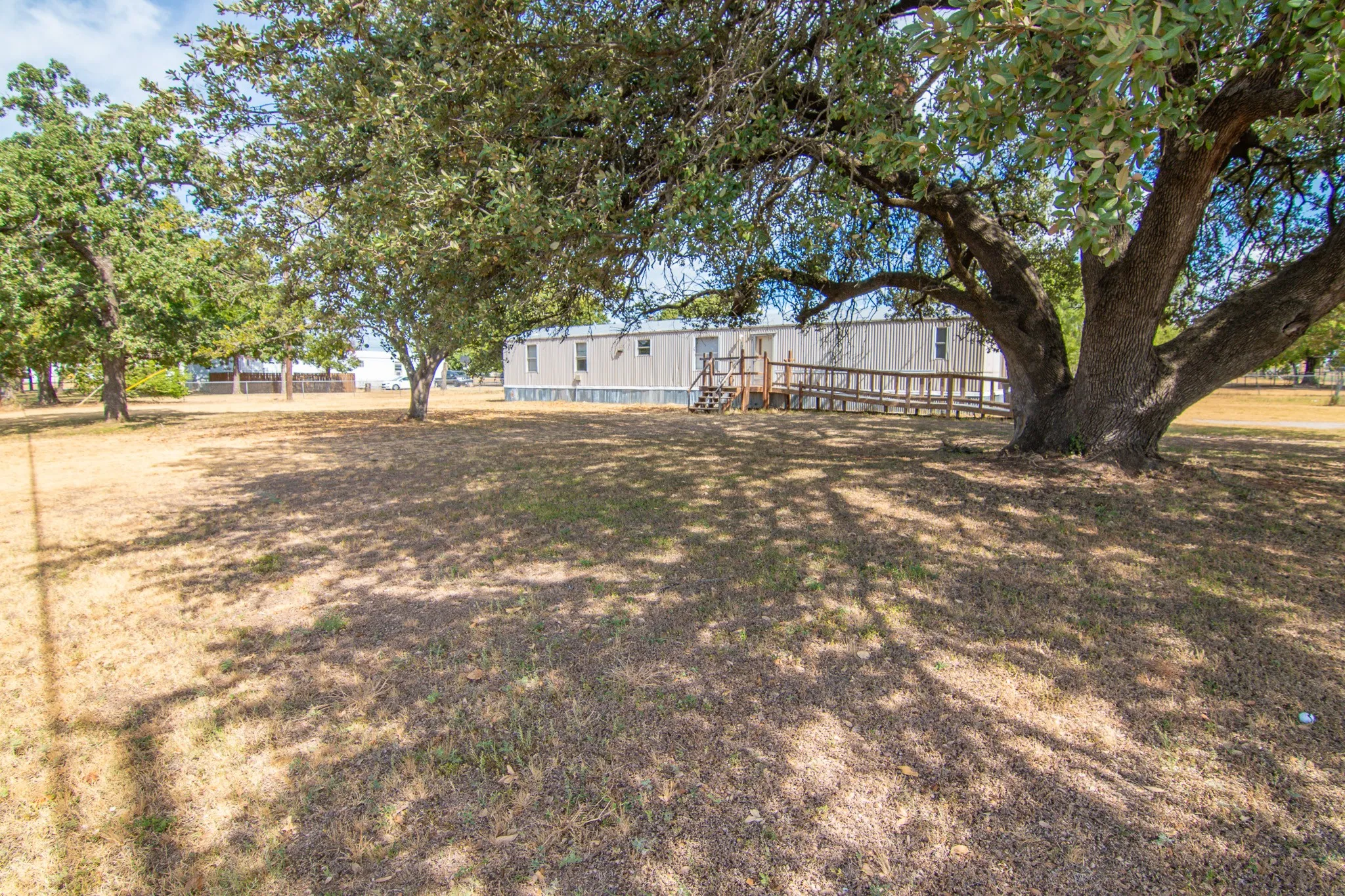 Mobile Home For Sale in Brown County , 102 Live Oak Road, Early, Texas 76802, 3 Bedroom, 2 Bathroom, Garage spaces, 1,216 Sqft, built in 0, mls#21400851, Real Estate Agent in Early, Homes For Sale in Brown county, Homes For Sale in Early, Realtor in Early Texas, Real Estate Brokerage Independent Realty Texas, Luminita Cordes Realtor