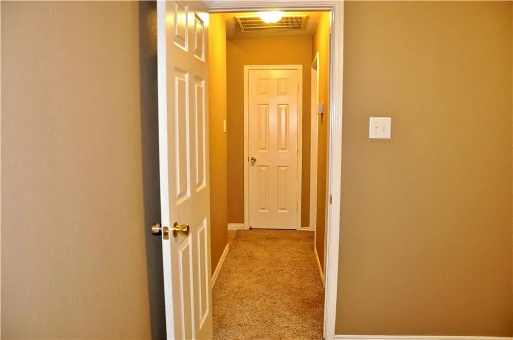 Hallway to secondary bedrooms