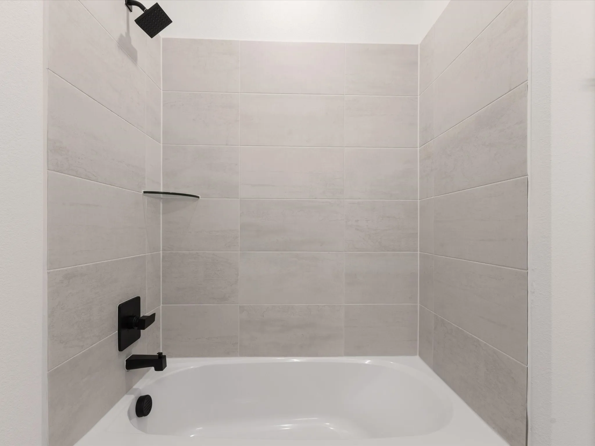 Ensuite bathroom featuring  shower combination