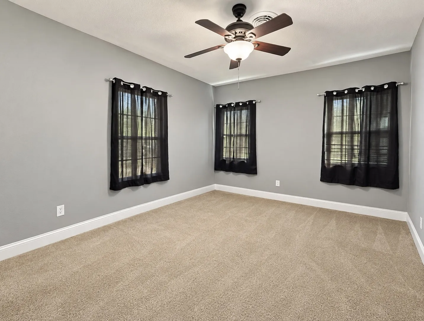 Neutral-toned carpeting throughout