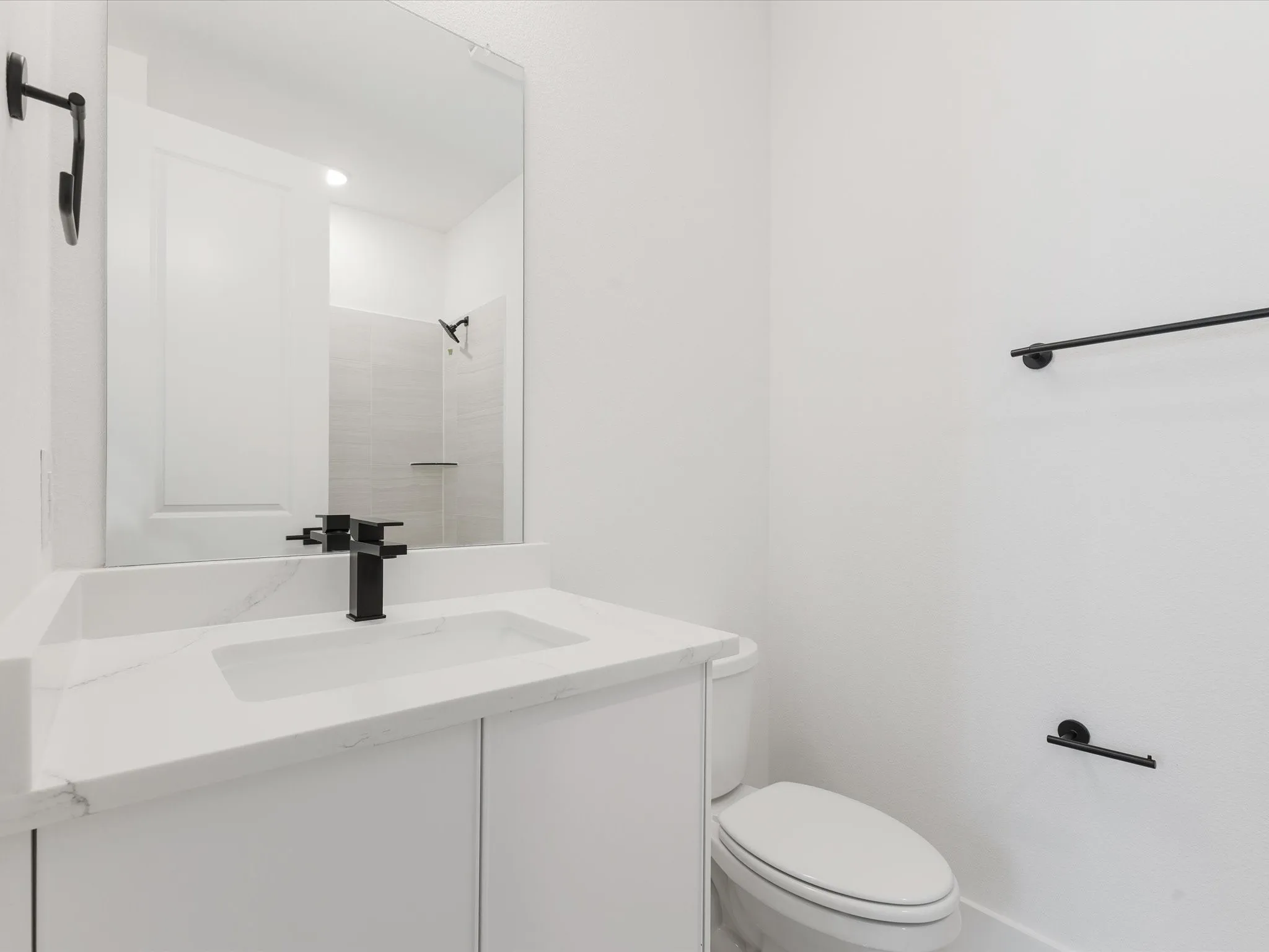 Ensuite Bathroom with vanity and tiled shower