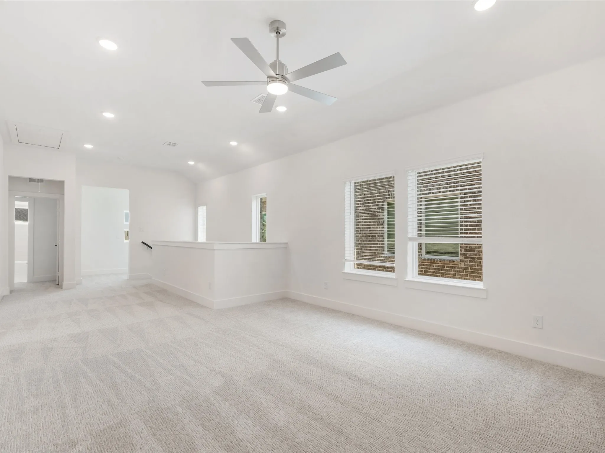Gameroom featuring recessed lighting, light carpet, and a ceiling fan