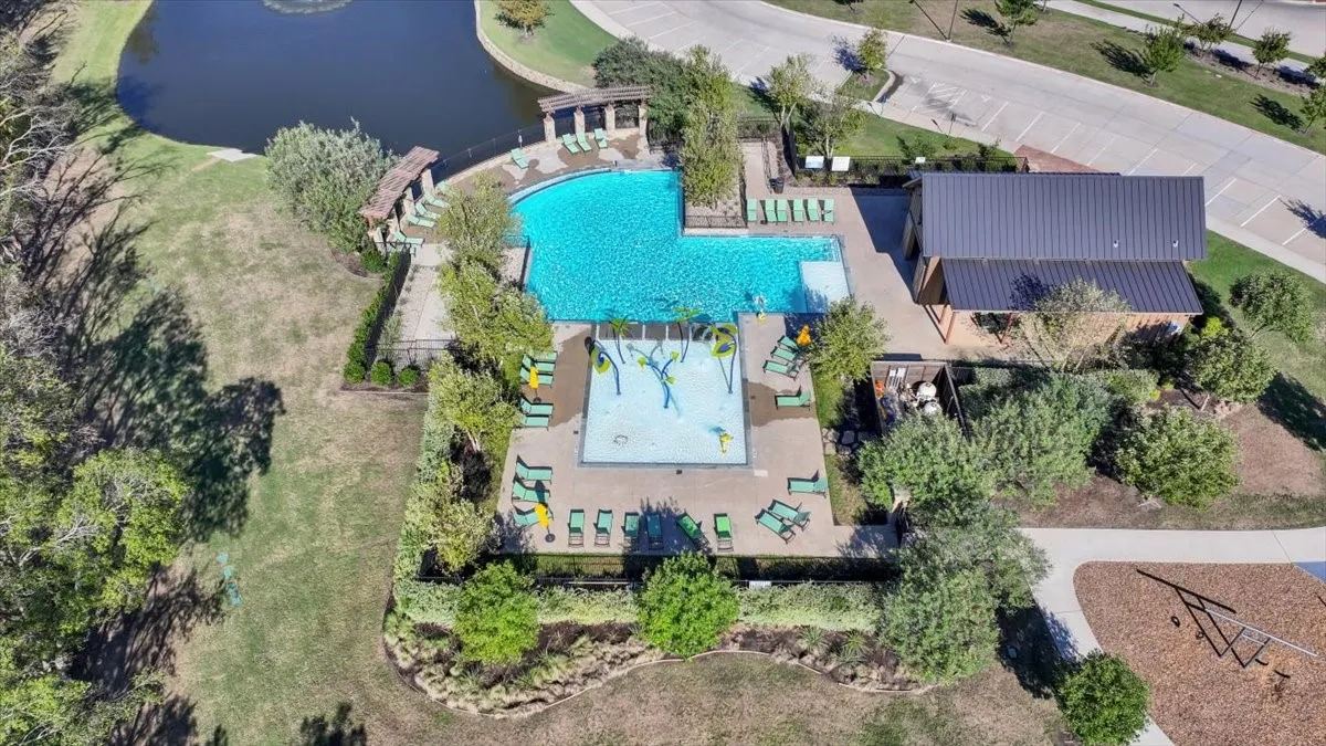 Aerial view of the Trailstone community pool, park, and pond