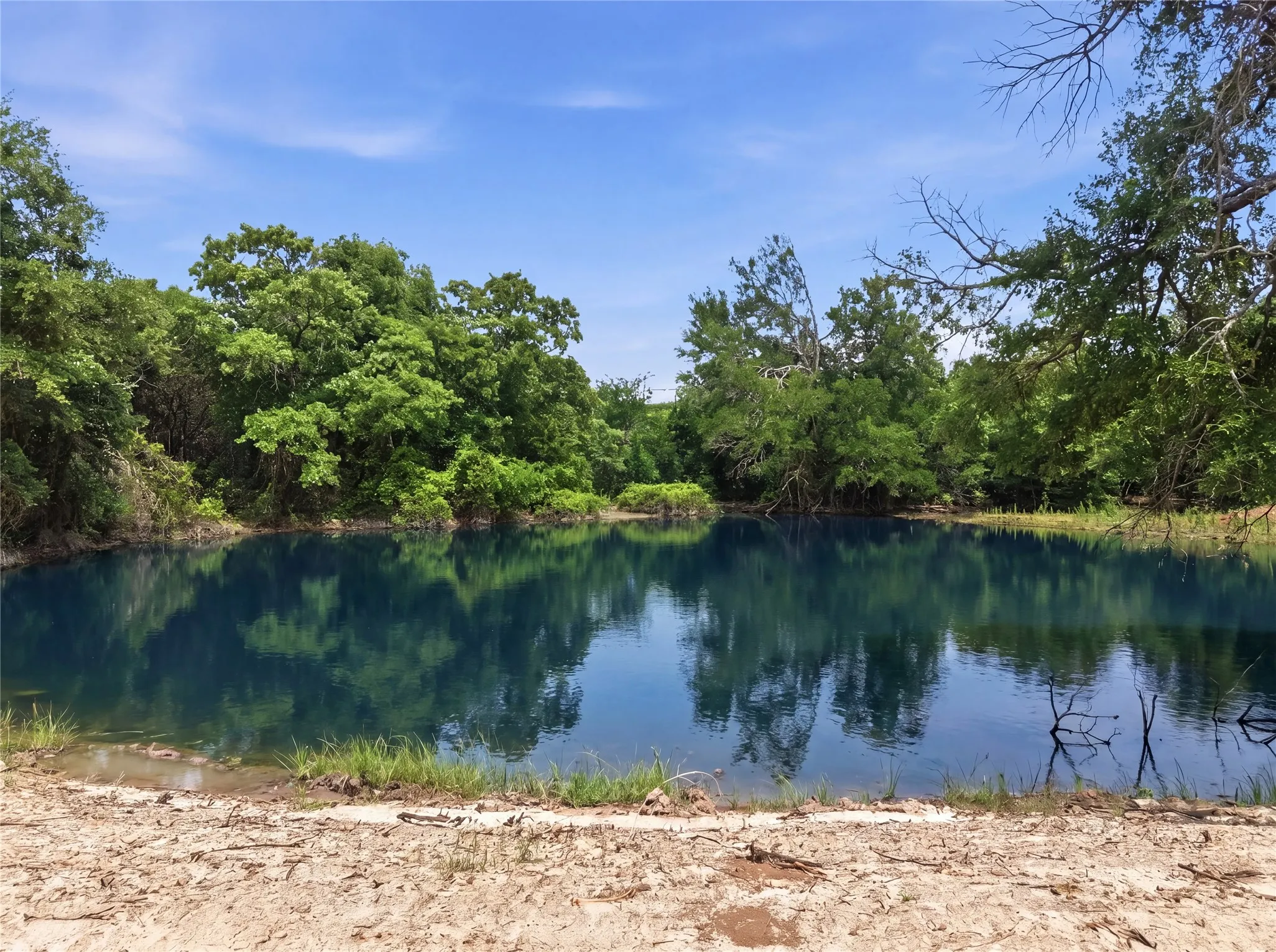 Natural water feature with dark blue water