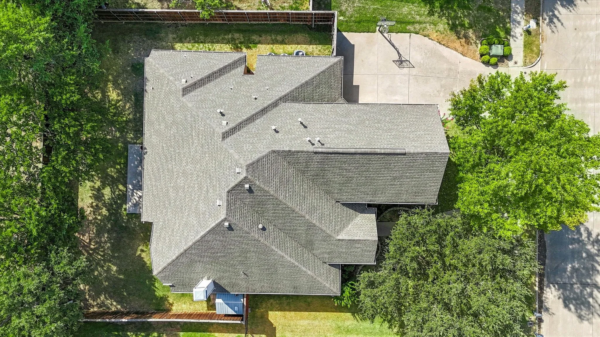 Asphalt shingle roofing with multiple gables