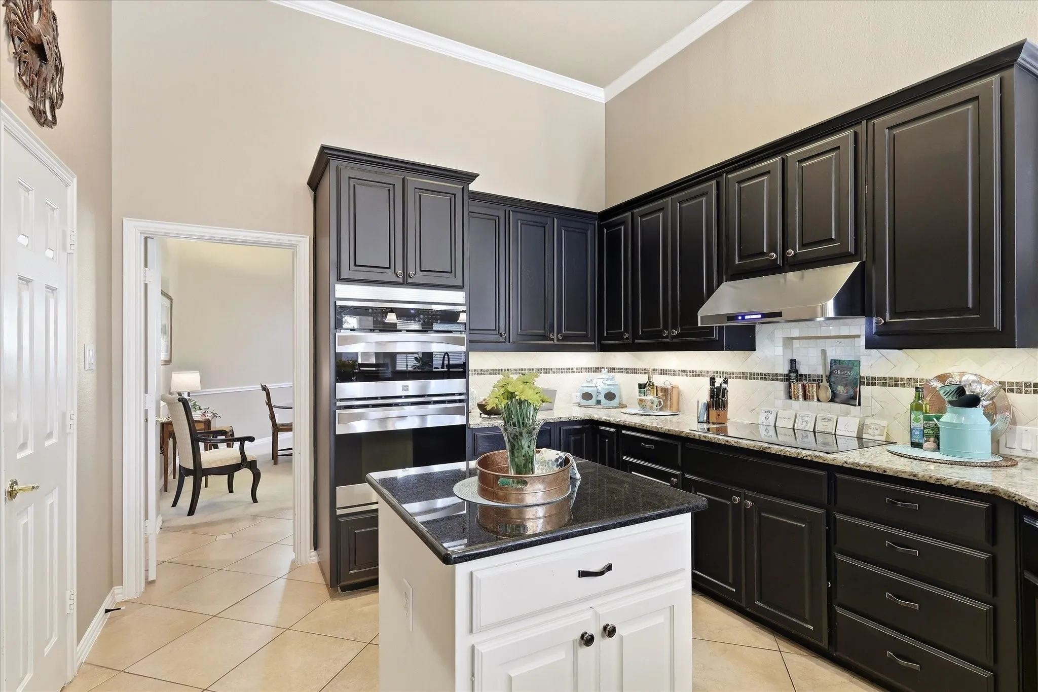 Vaulted ceiling, two-panel interior doors, light-colored carpeting, wall-mounted shelving