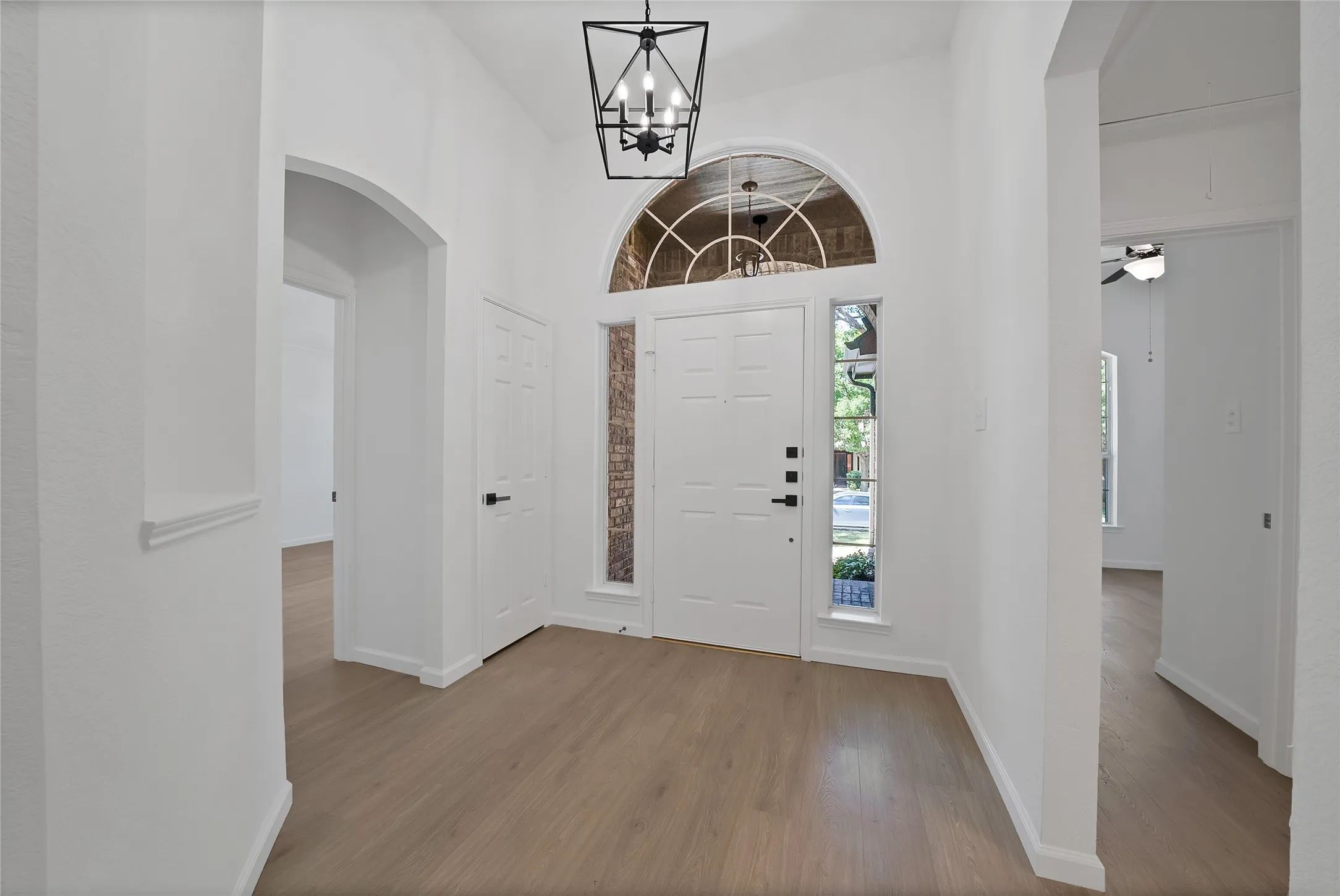 Beautiful light colored luxury laminate flooring welcomes you into the stunning home and extends throughout most of the home. No carpet!
