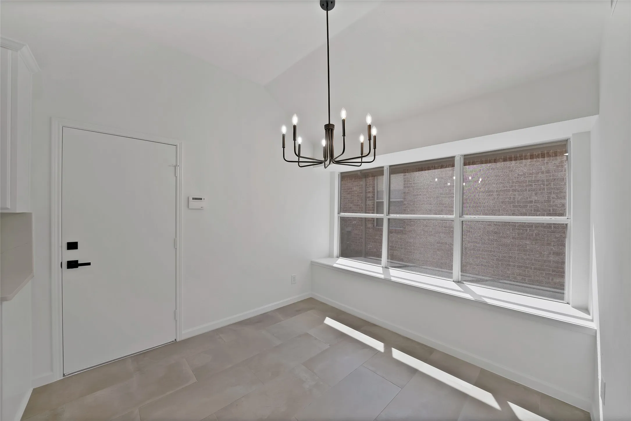 Large windows let the light shine in. Don't miss the charming window seat.