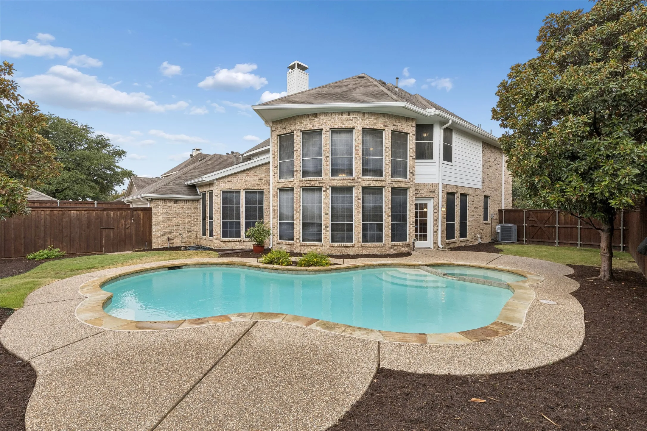Back yard with pool and spa