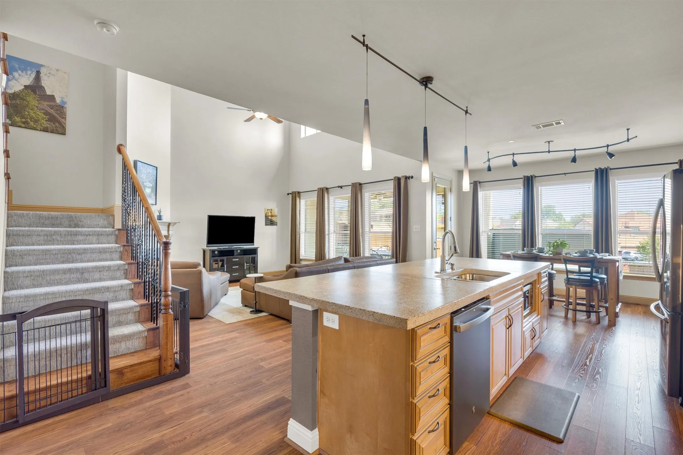 Level 1 kitchen and living area overlooking the covered patio