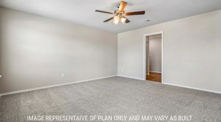 Neutral wall paint, ceiling fan with light fixture, gray carpeting, and white trim