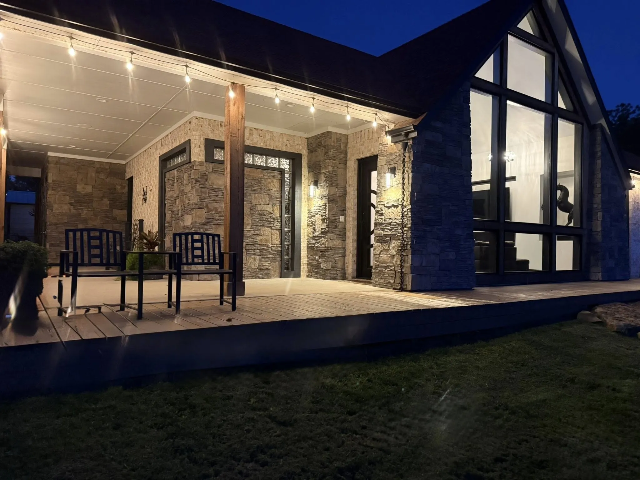 Night-time view of home's entrance
