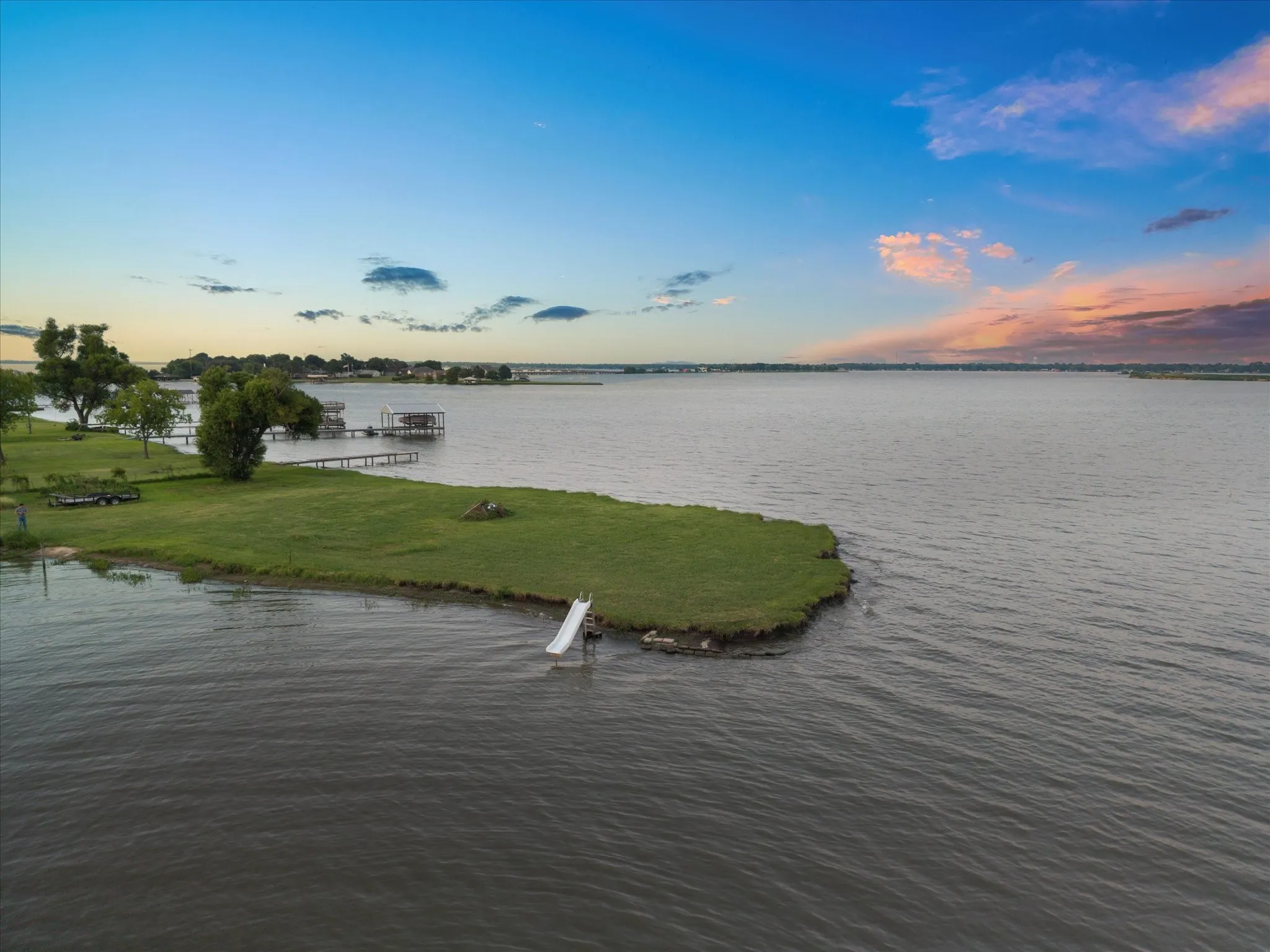 Waterfront property with a natural shoreline and mature trees