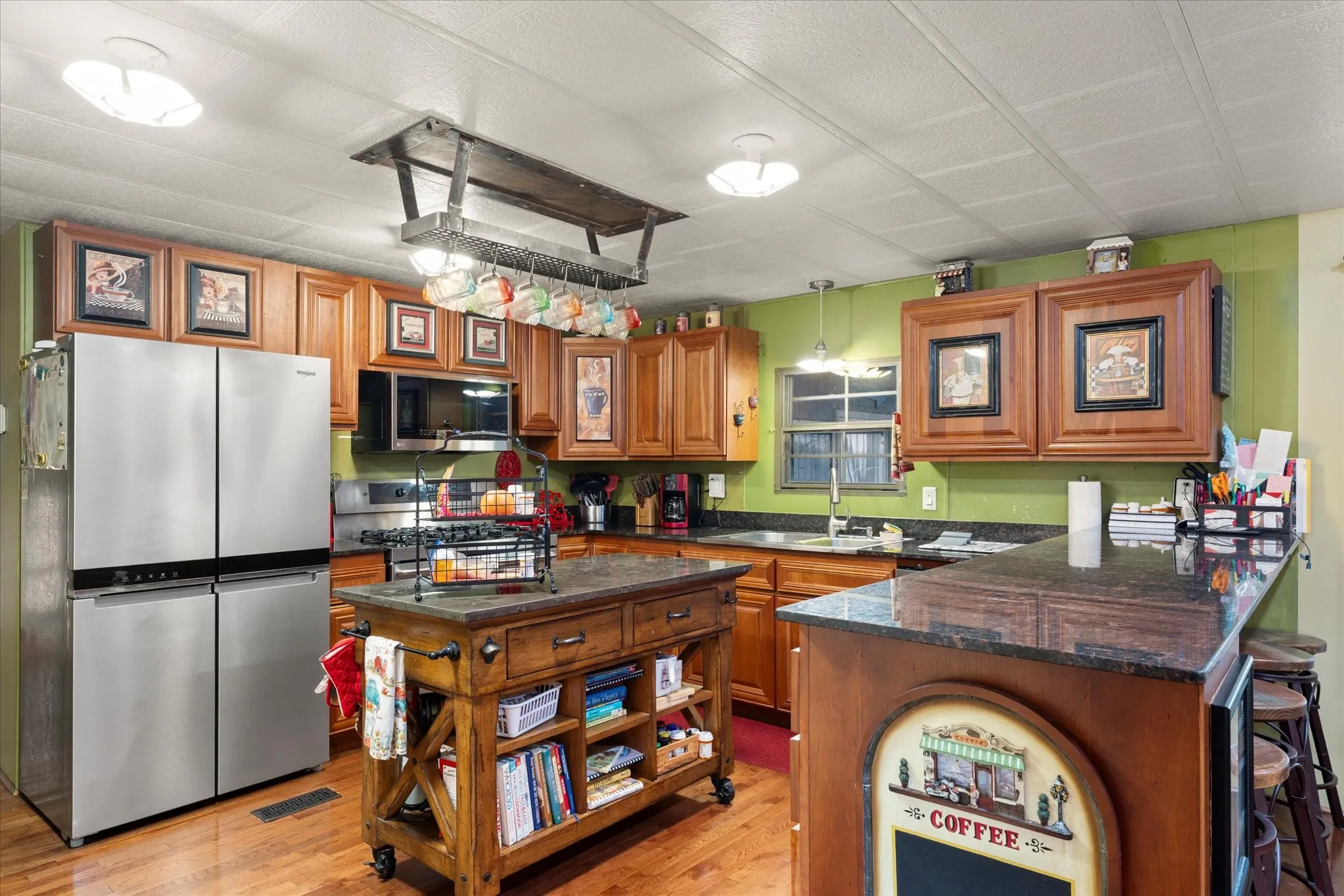 Wood-finish flooring with a multi-door stainless steel refrigerator