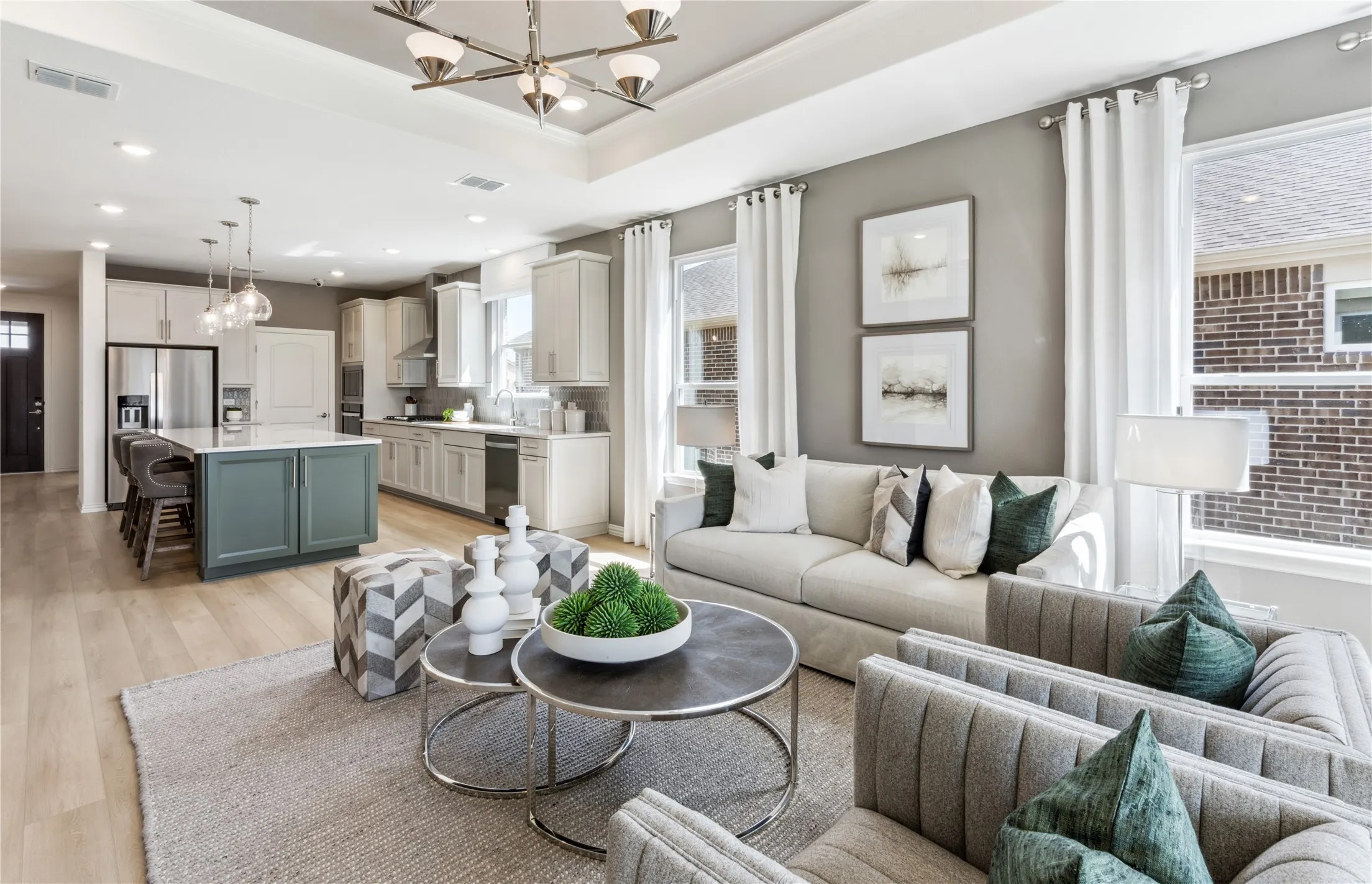 *Model Representation - Gathering room with view of main living areas