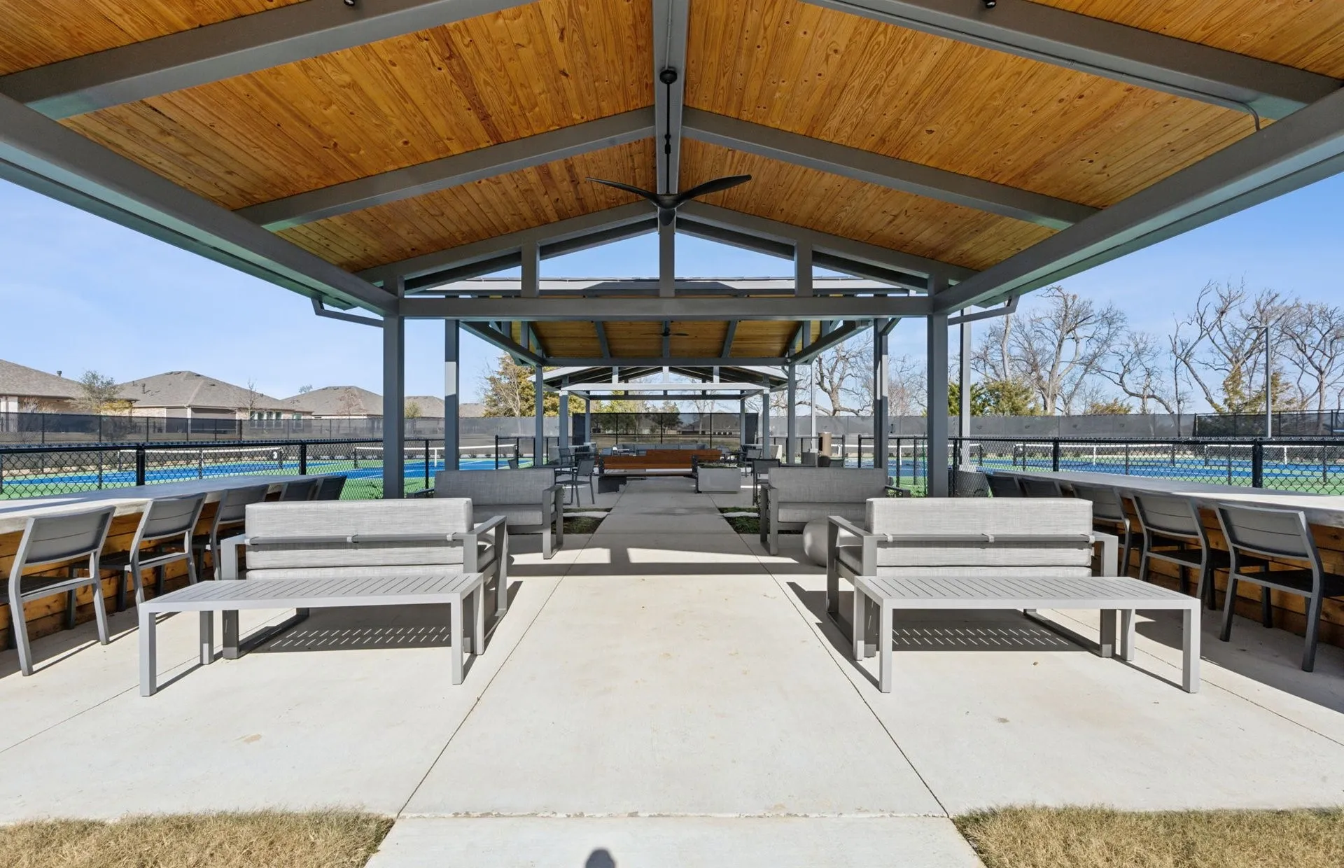 Shaded seating at the pickleball courts