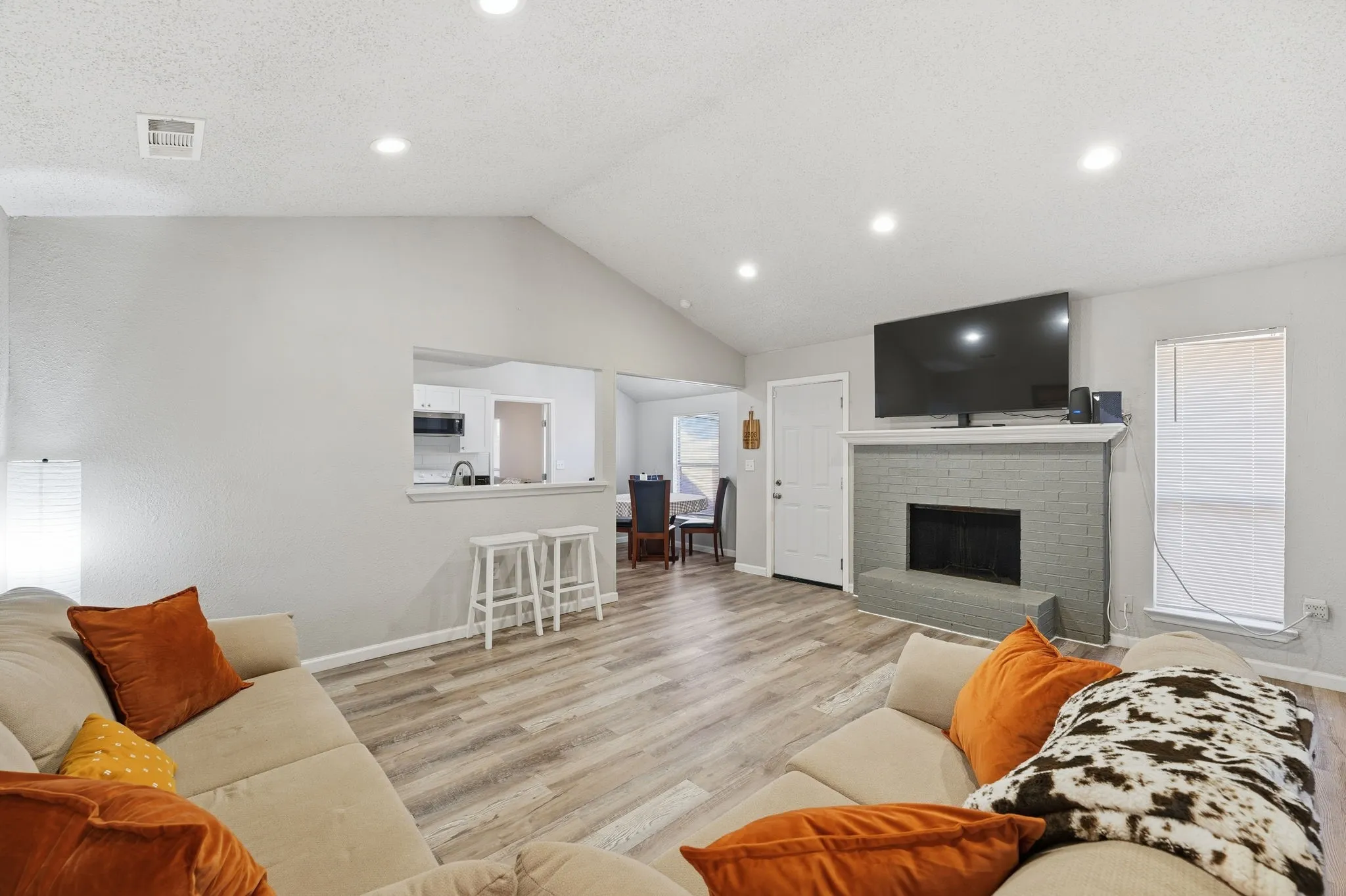 Easy access to kitchen and bar area for entertaining.