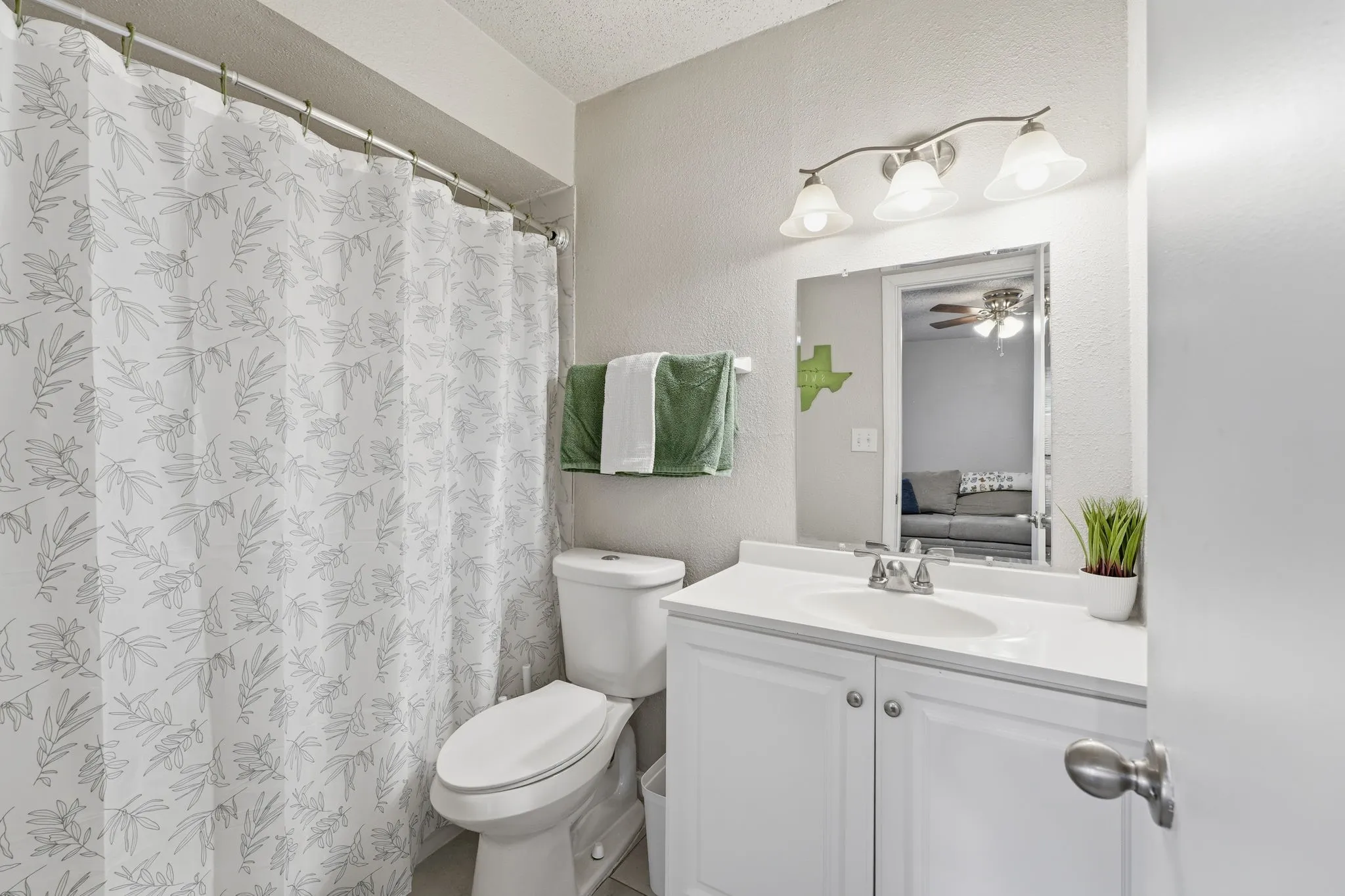 Secondary bathroom attached to second bedroom.