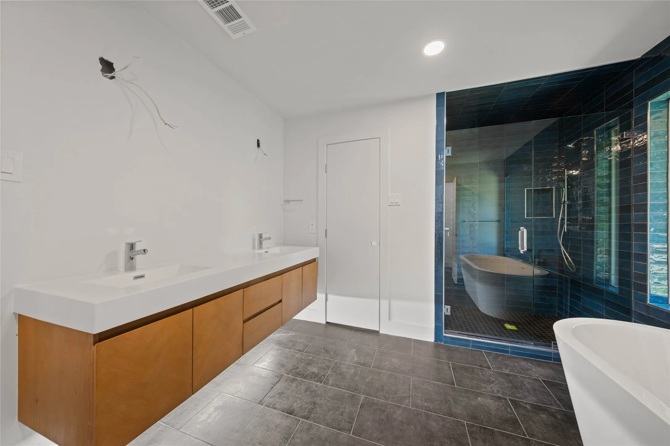 Installed soon: light fixtures, mirrors, and hardware